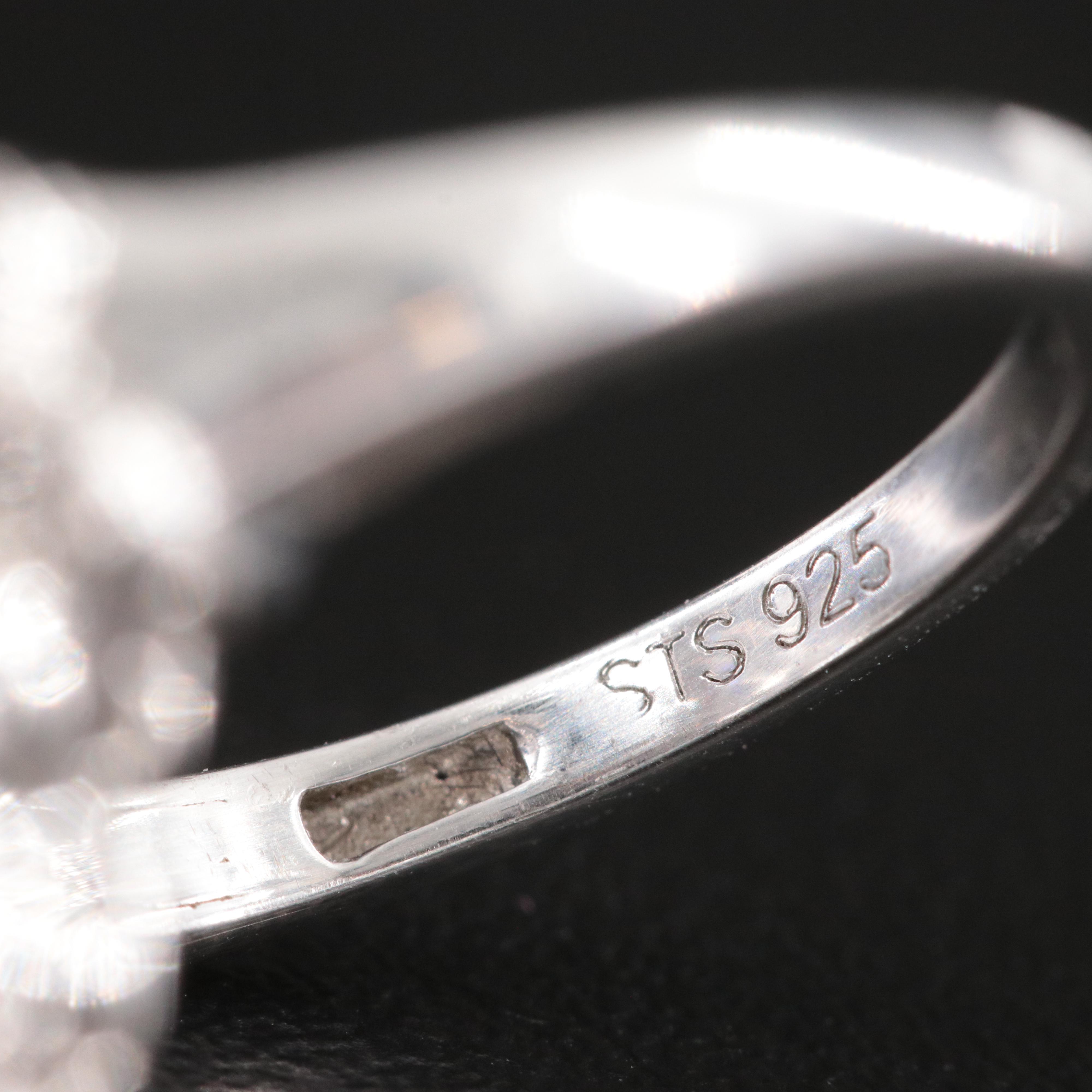 Sterling Tanzanite and Whire Zircon Ring