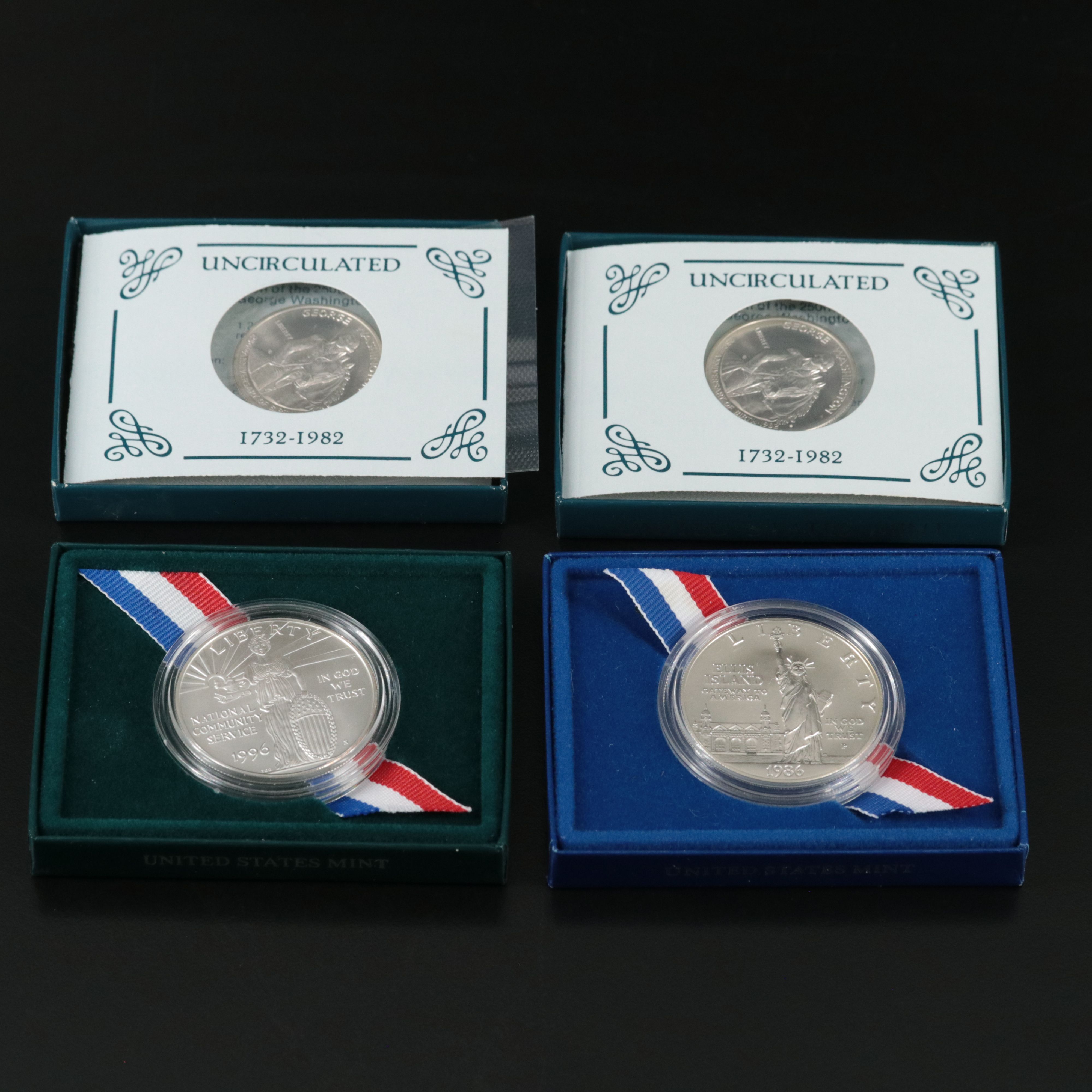 Four Uncirculated Modern Commemorative  Silver Coins