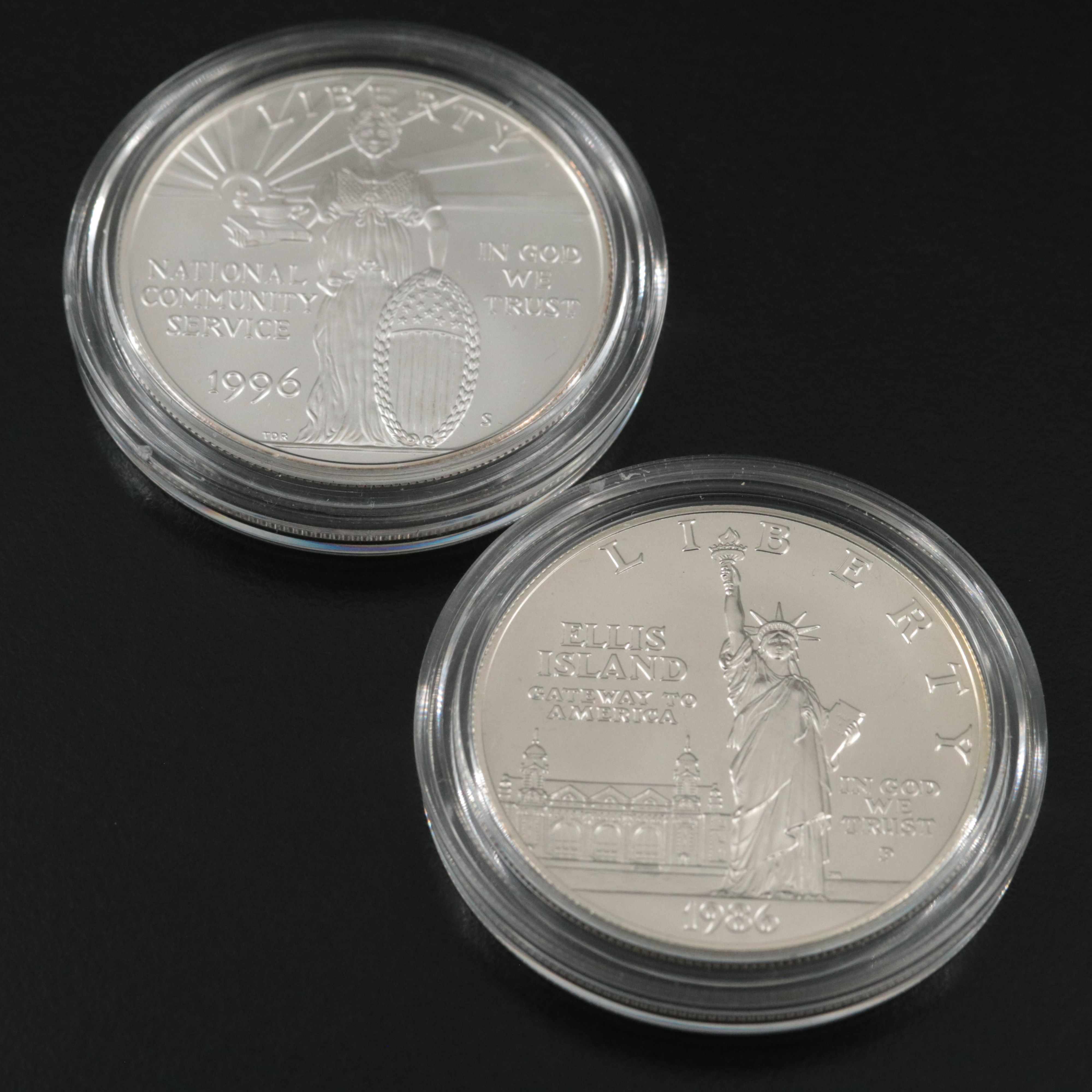 Four Uncirculated Modern Commemorative  Silver Coins