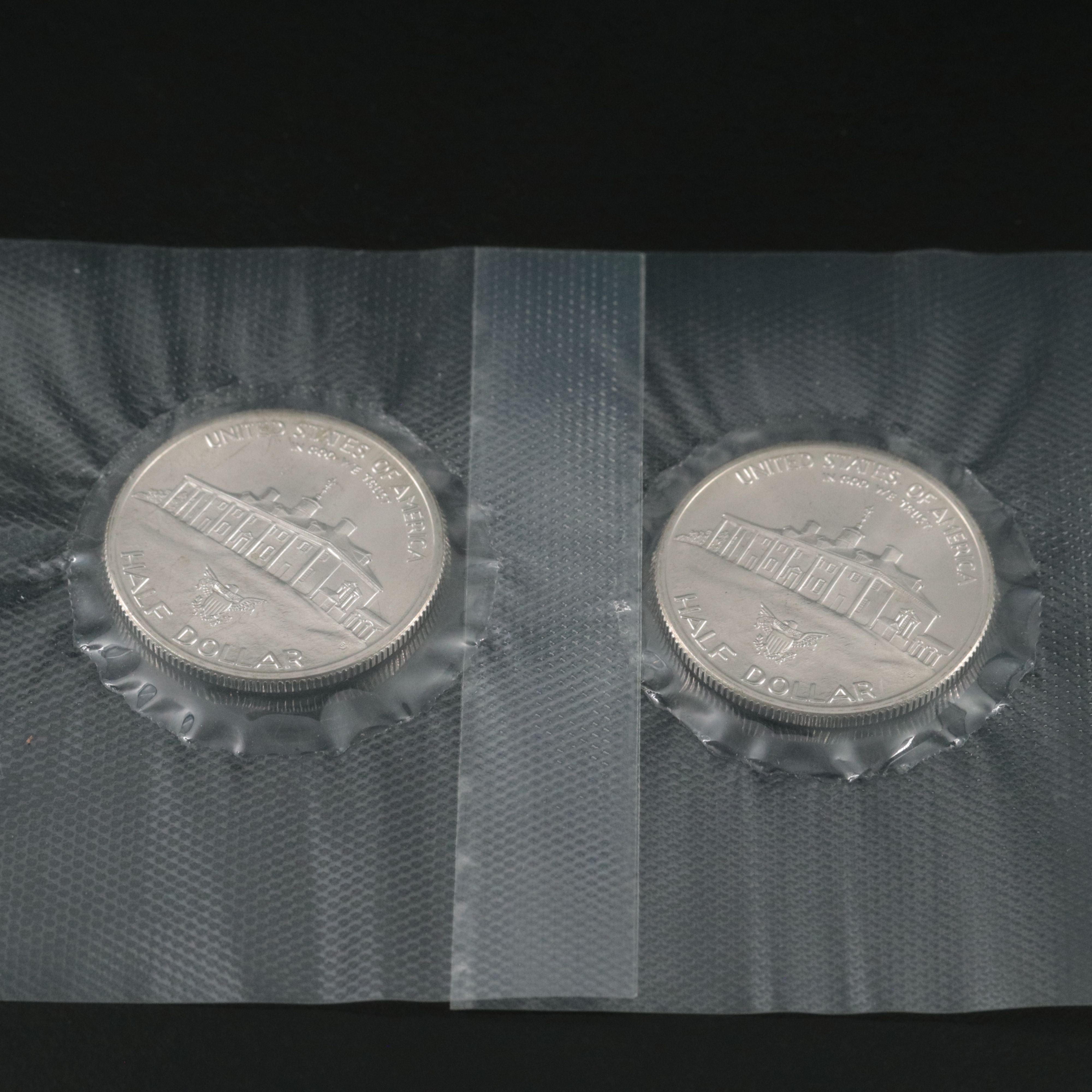 Four Uncirculated Modern Commemorative  Silver Coins