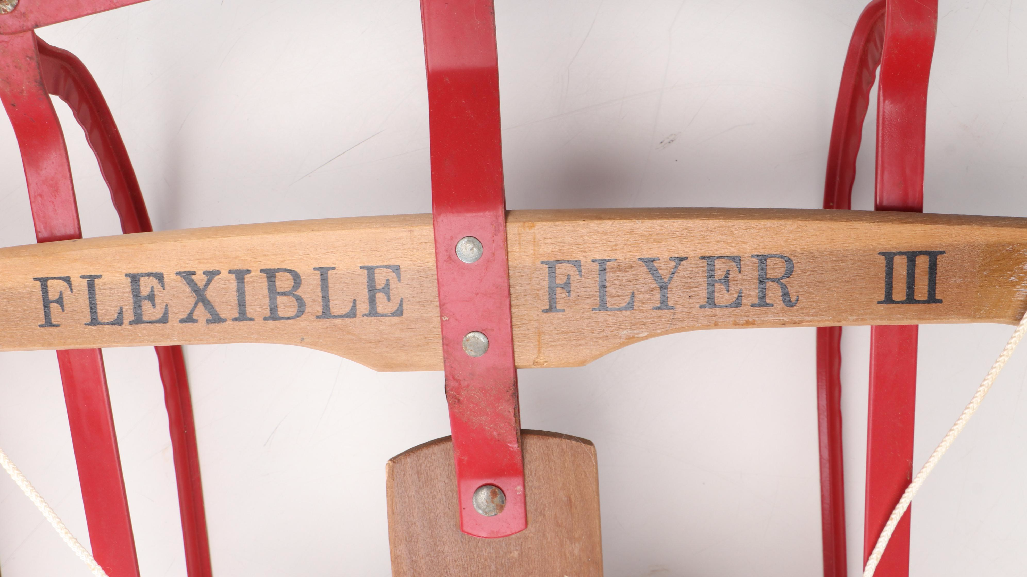 Two Flexible Flyer III Wood and Metal Sleds