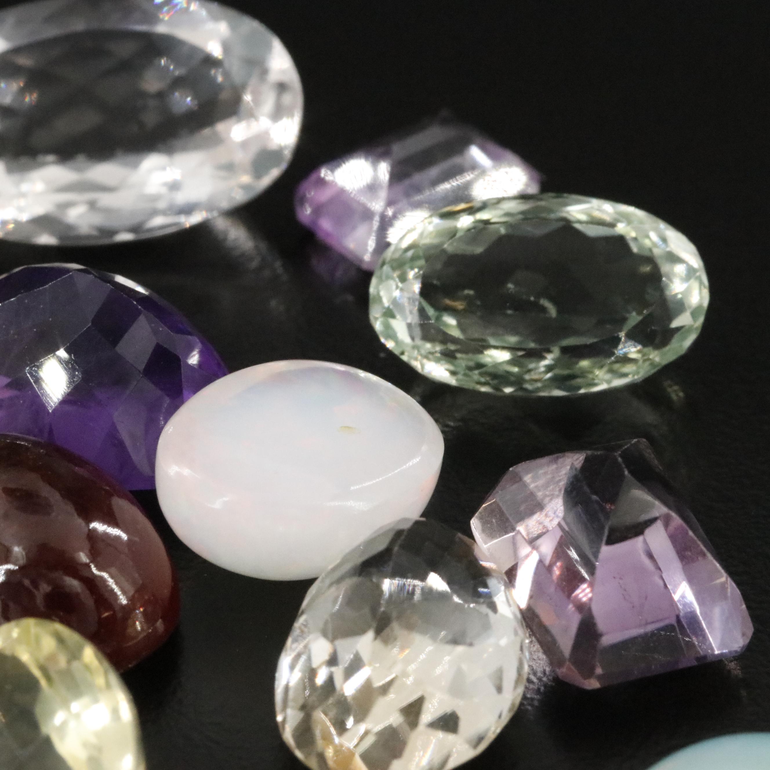 Loose 154.10 Gemstones Featuring Amethyst, Opal and Aquamarine