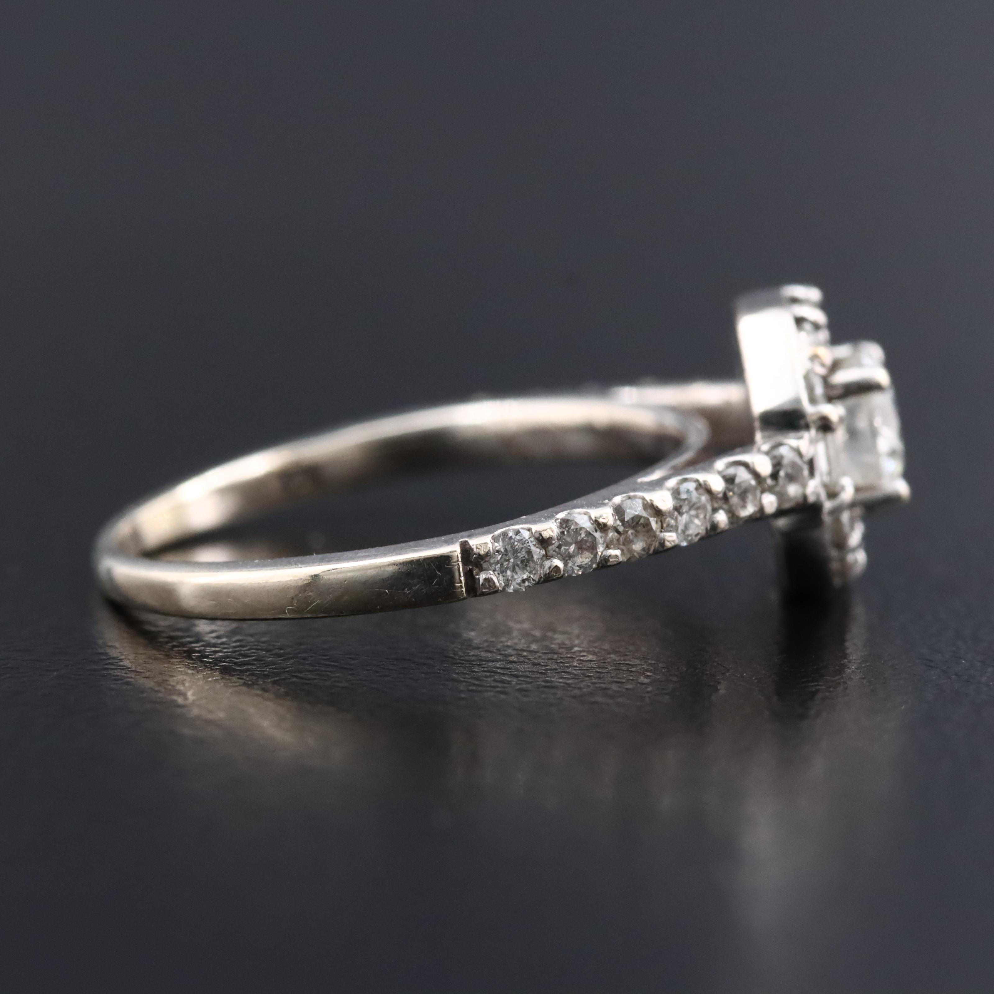 14K 0.79 CTW Diamond Halo Ring