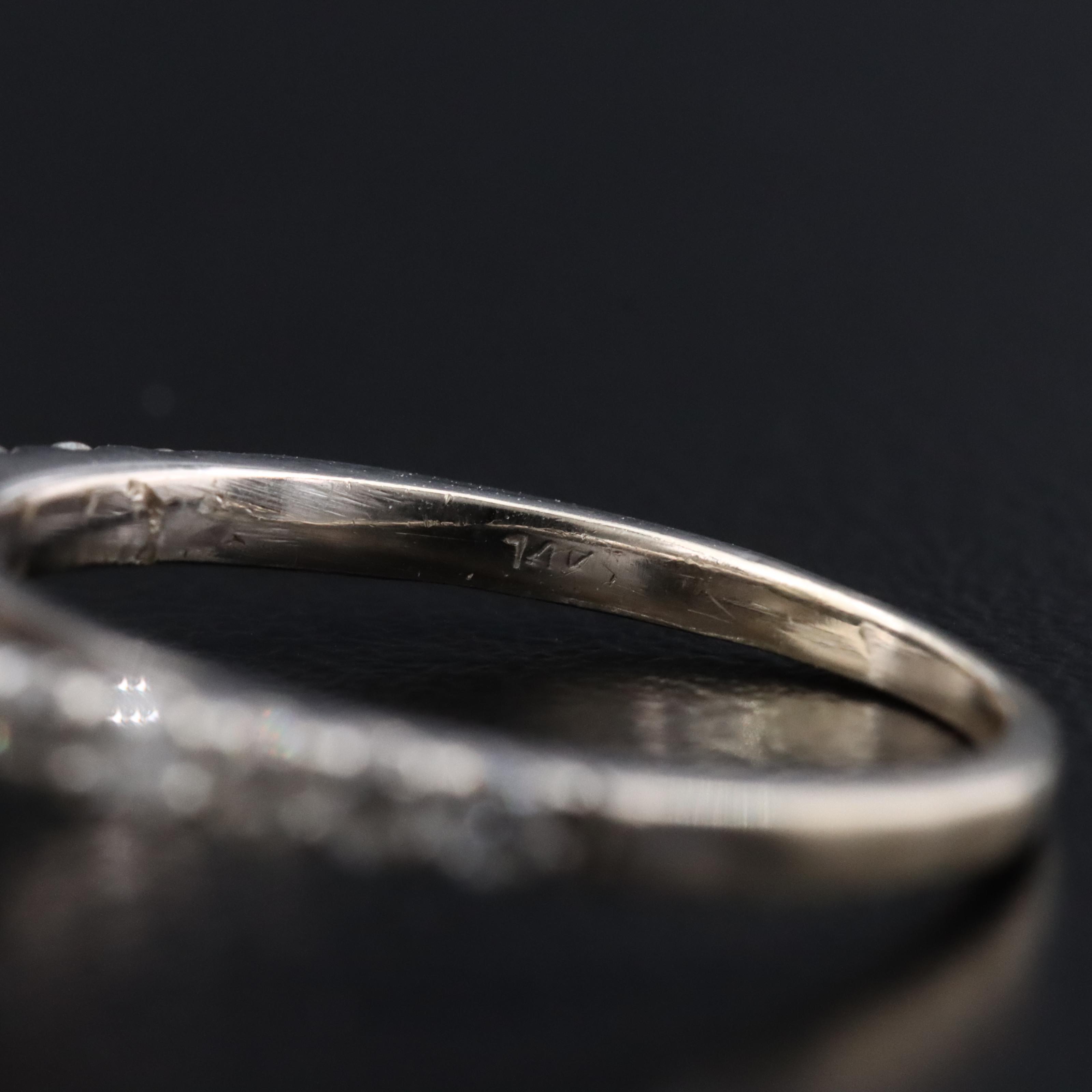 14K 0.79 CTW Diamond Halo Ring