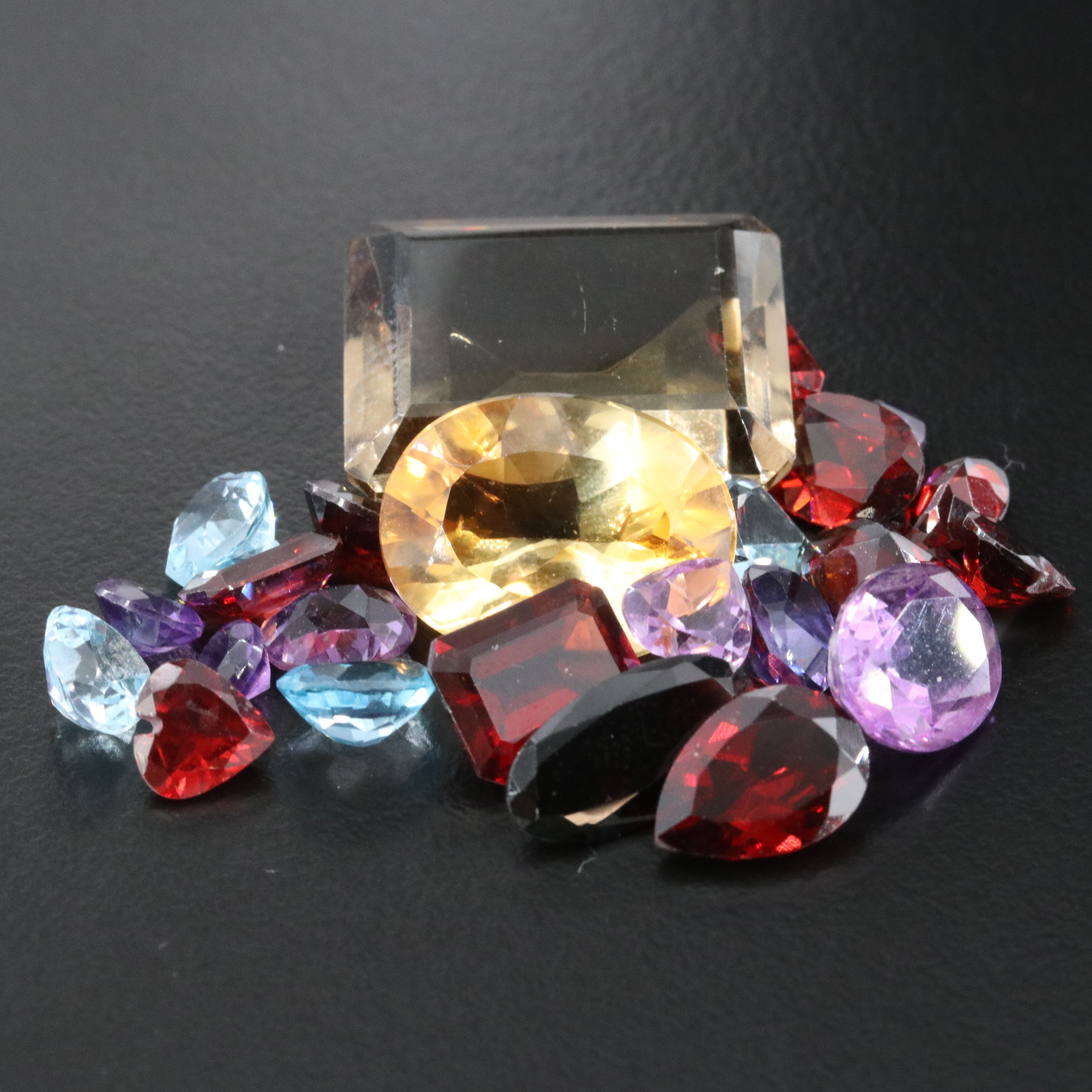 Loose 53.49 CTW Gemstone Collection Featuring Smoky Quartz, Citrine and Garnet