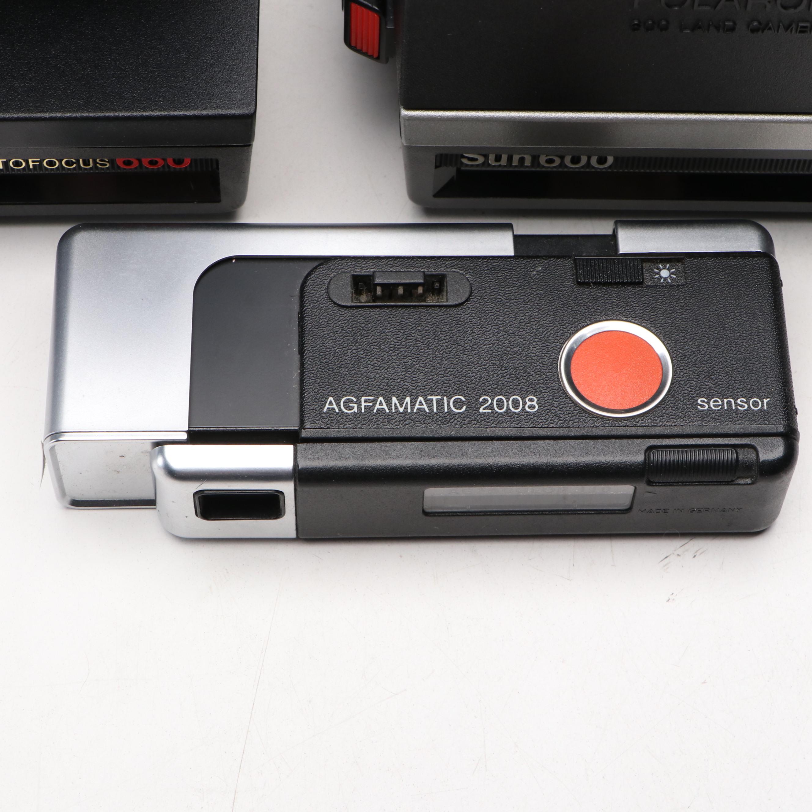 Autofocus 660, Sun 600 Polaroid Cameras, Agfa 2008 and Vivitar Series 1 Lens