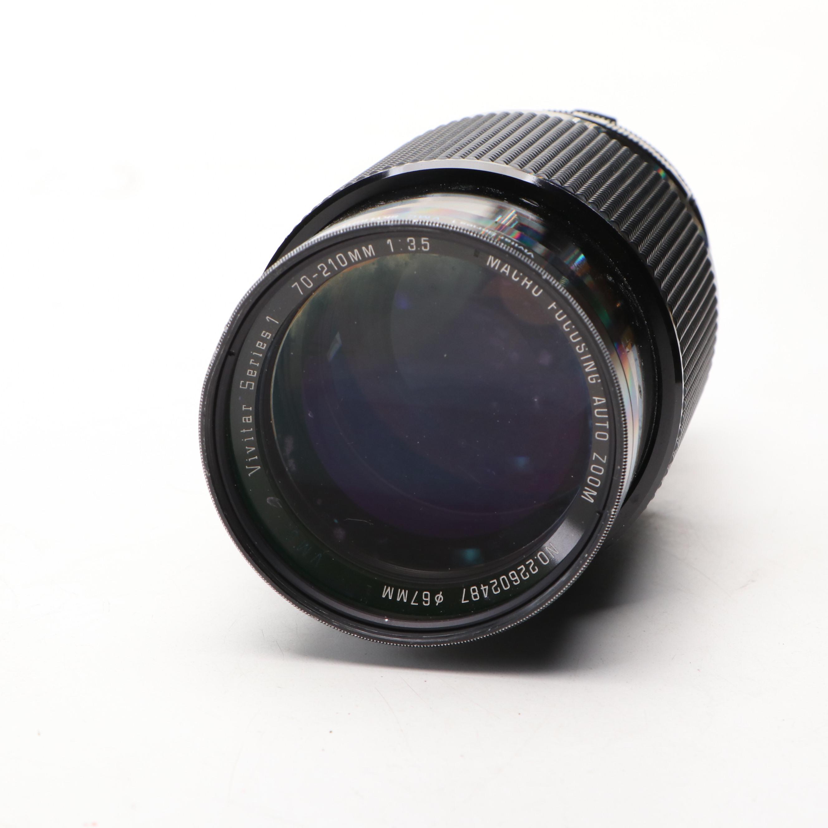 Autofocus 660, Sun 600 Polaroid Cameras, Agfa 2008 and Vivitar Series 1 Lens