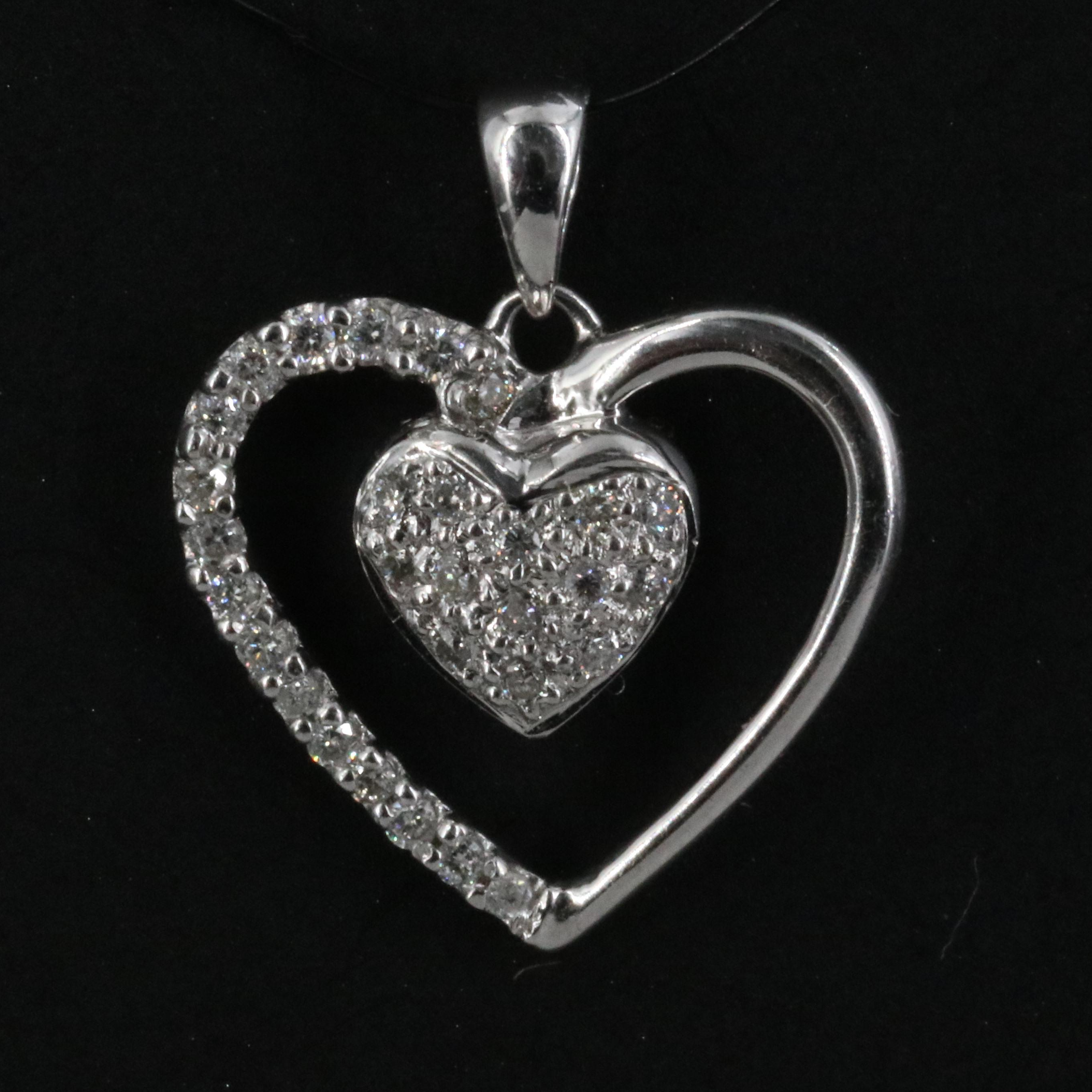18K 0.09 CTW Diamond Heart Pendant