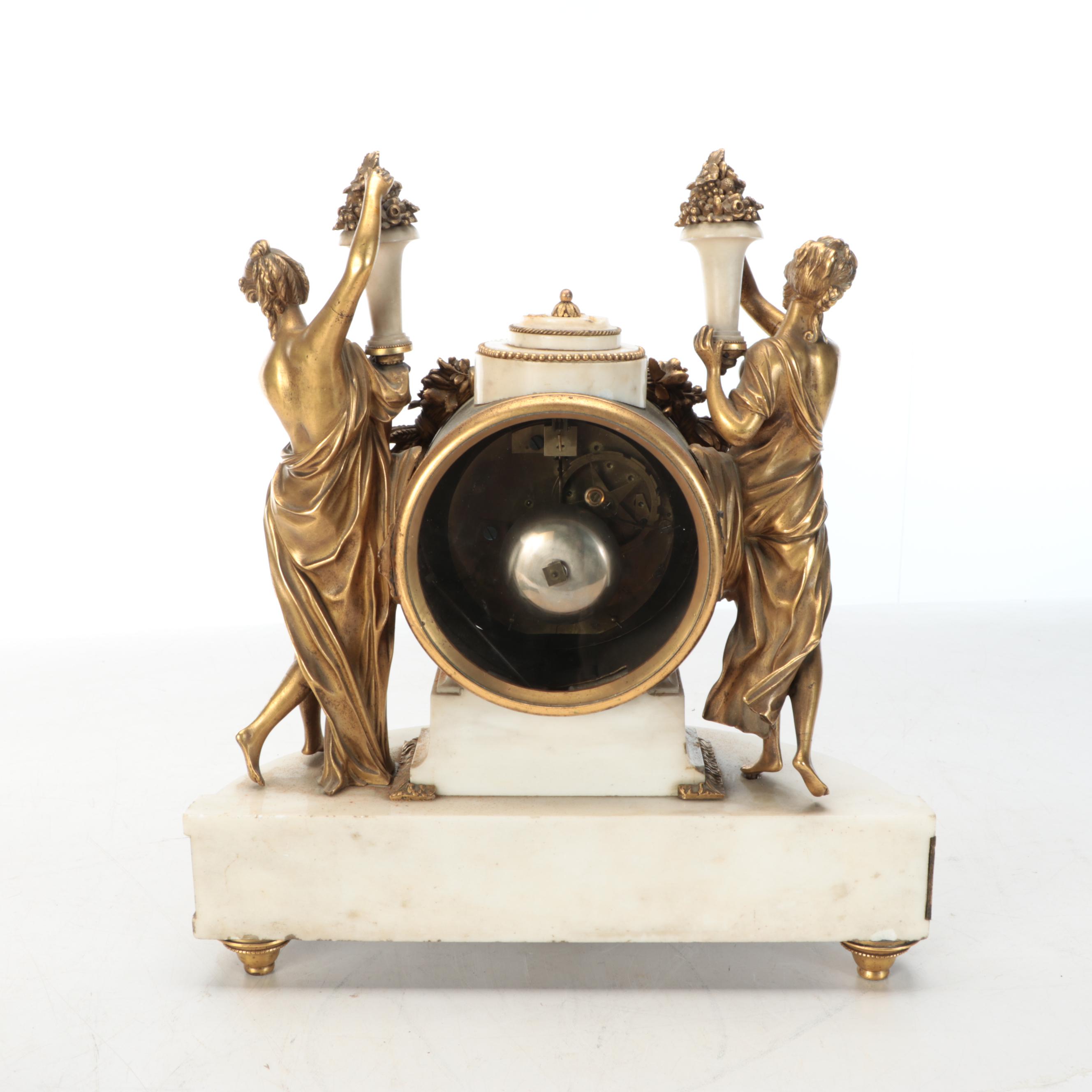 Louis Philippe Style Gilt Metal and Marble Figural Table Clock