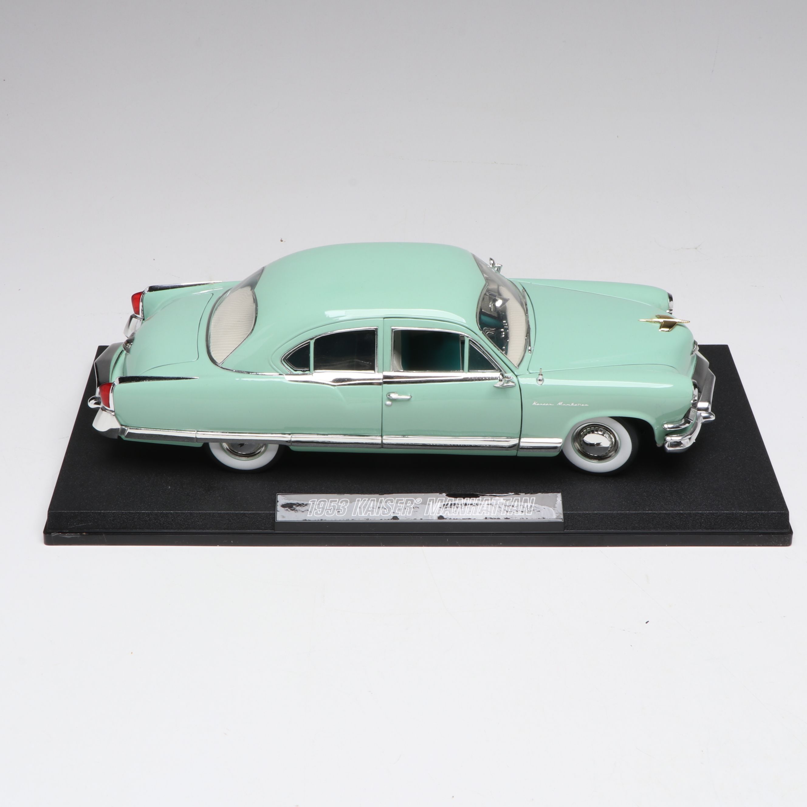 1957 Studebaker Gold Hawk with More Scale Model Diecast Cars and Stands