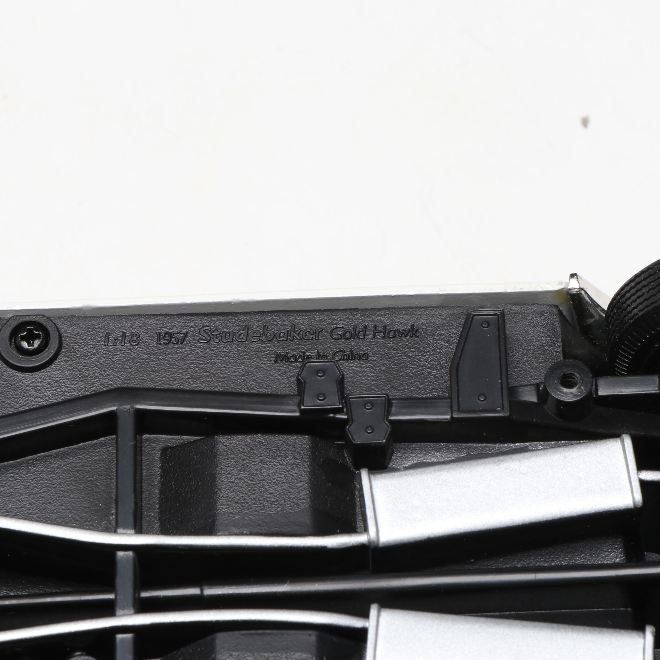 1957 Studebaker Gold Hawk with More Scale Model Diecast Cars and Stands