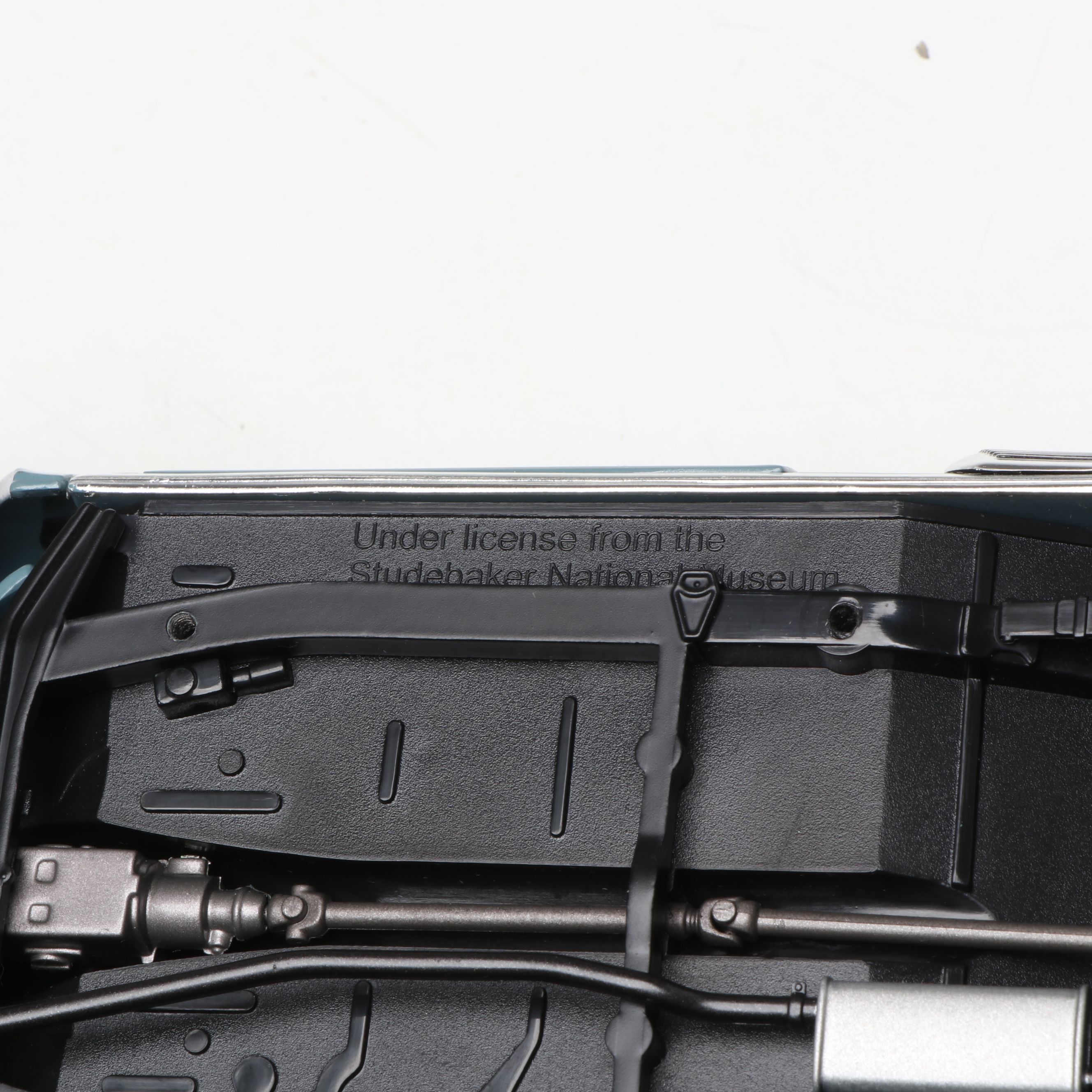 1957 Studebaker Gold Hawk with More Scale Model Diecast Cars and Stands