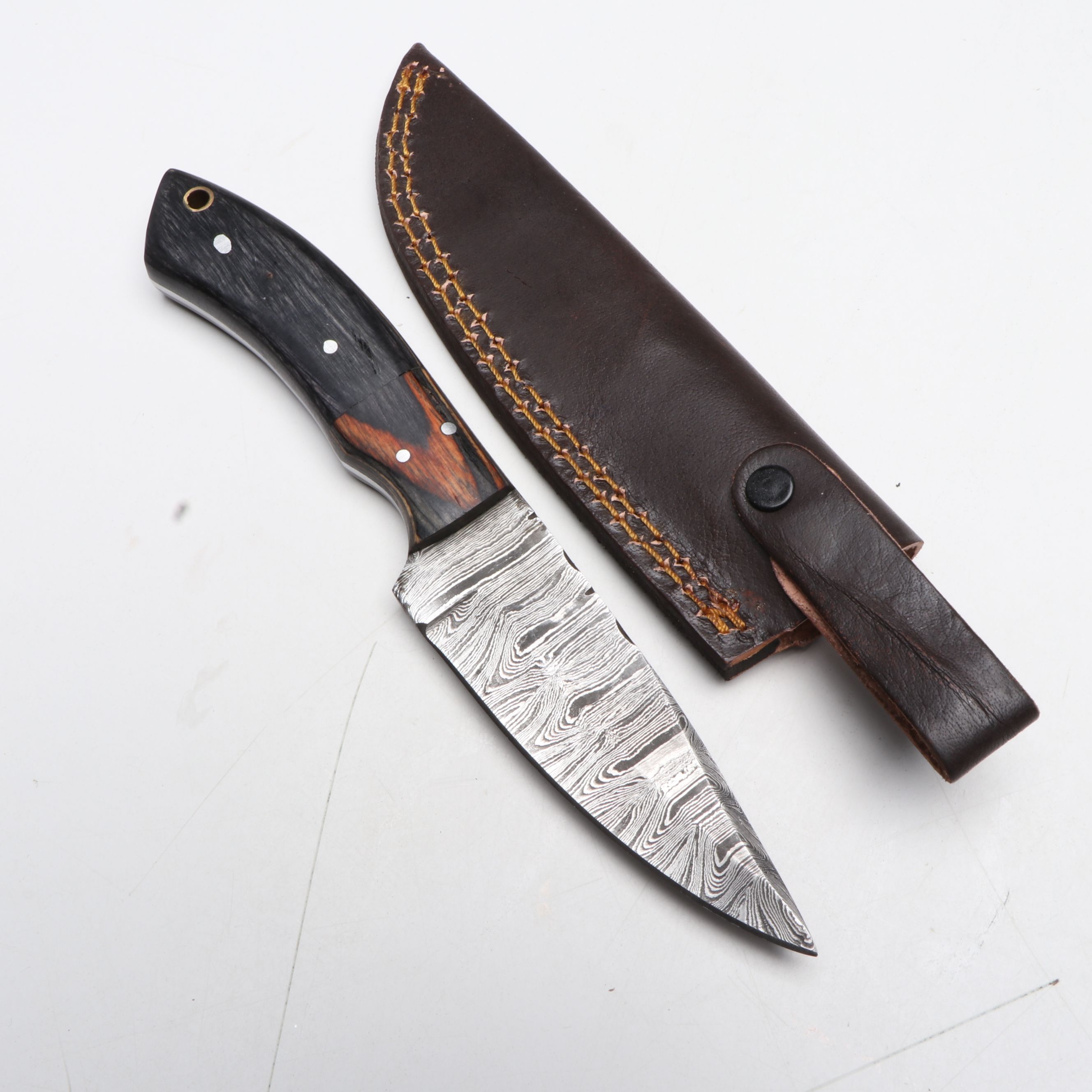 Damascus Steel Hunting Knives in Leather Scabbards