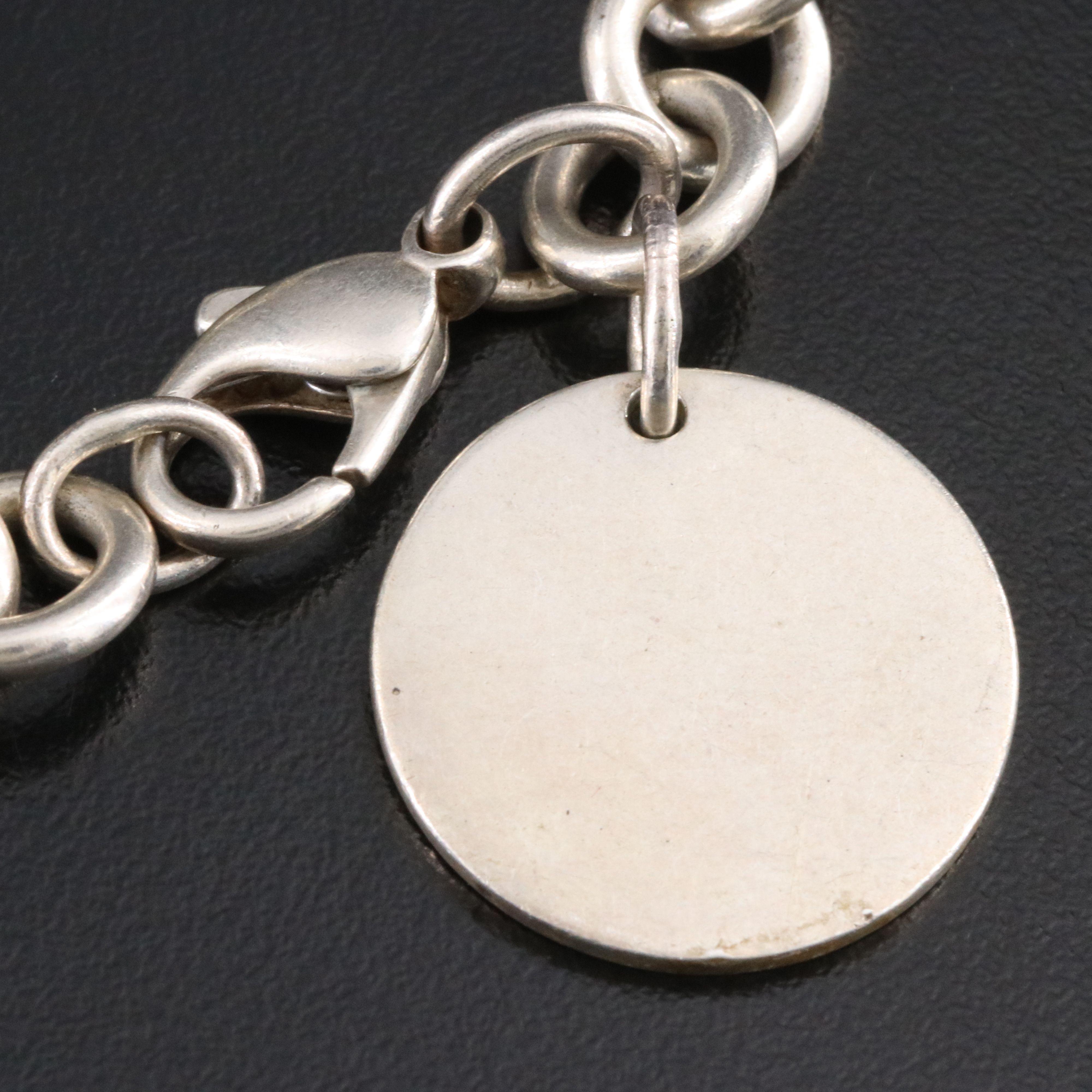 Tiffany & Co. Return to Tiffany Sterling Round Tag Charm Bracelet