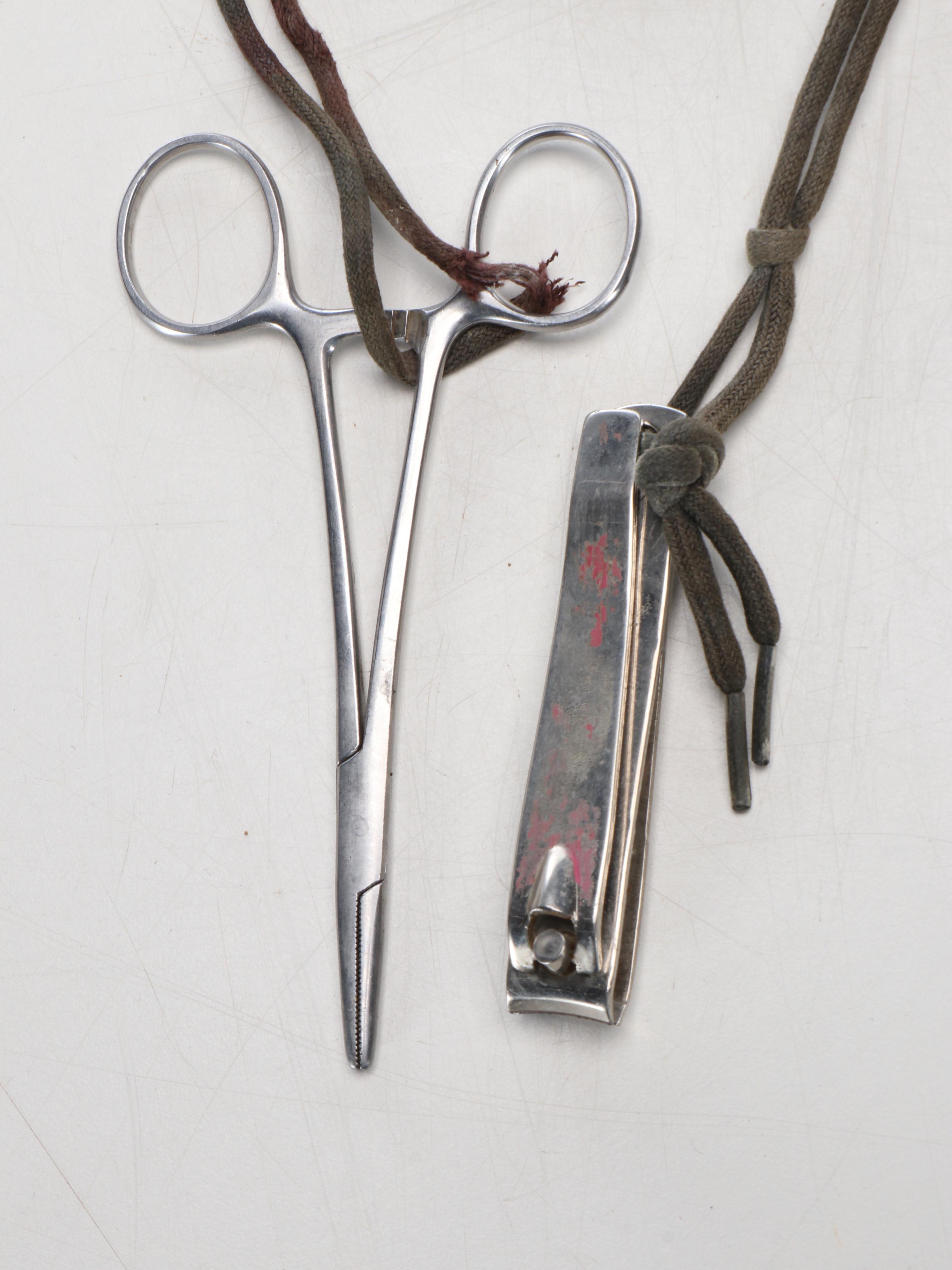 Columbia Fishing Vest with Shakespeare and Other Fishing Poles and Gear