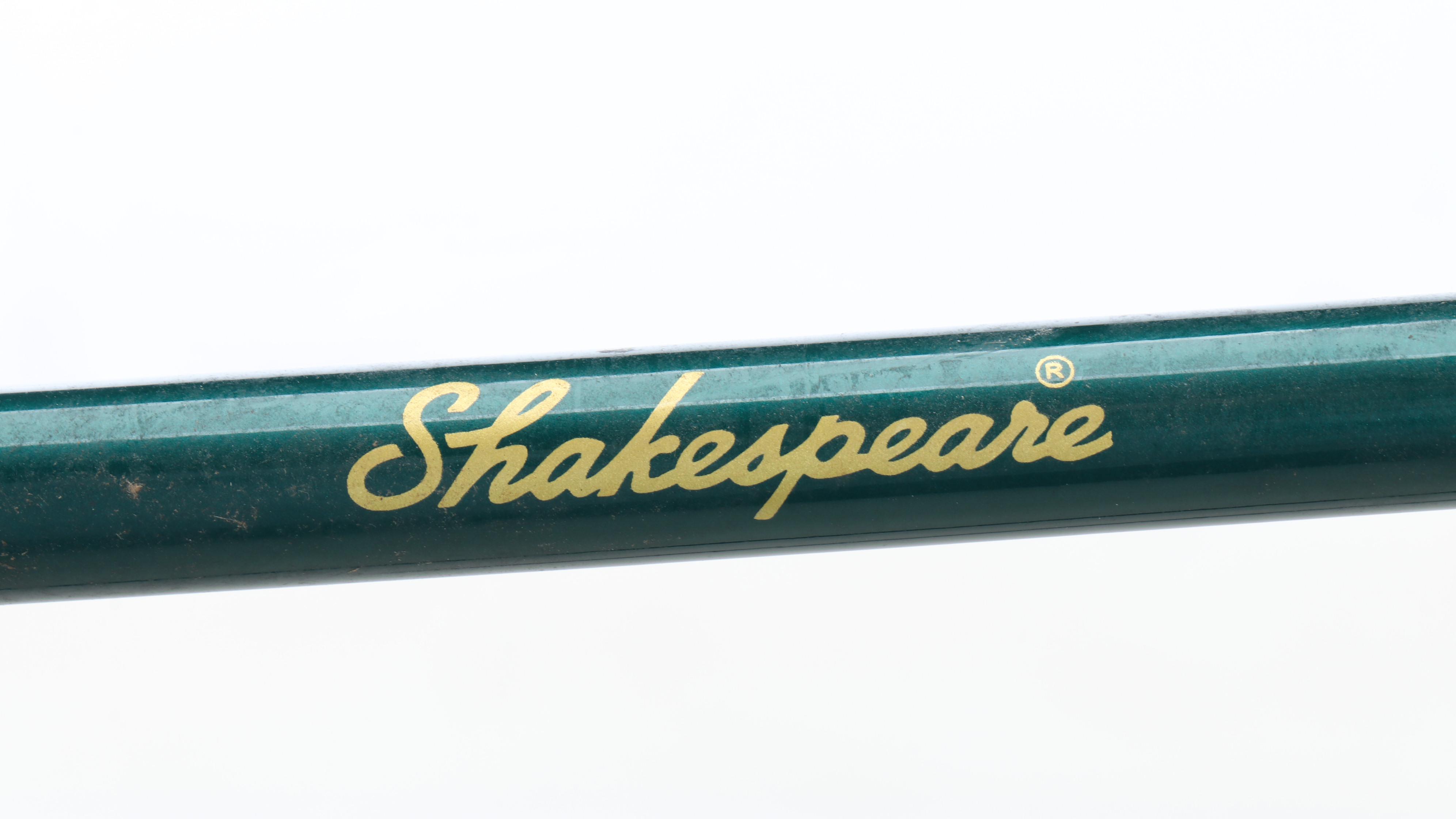 Columbia Fishing Vest with Shakespeare and Other Fishing Poles and Gear