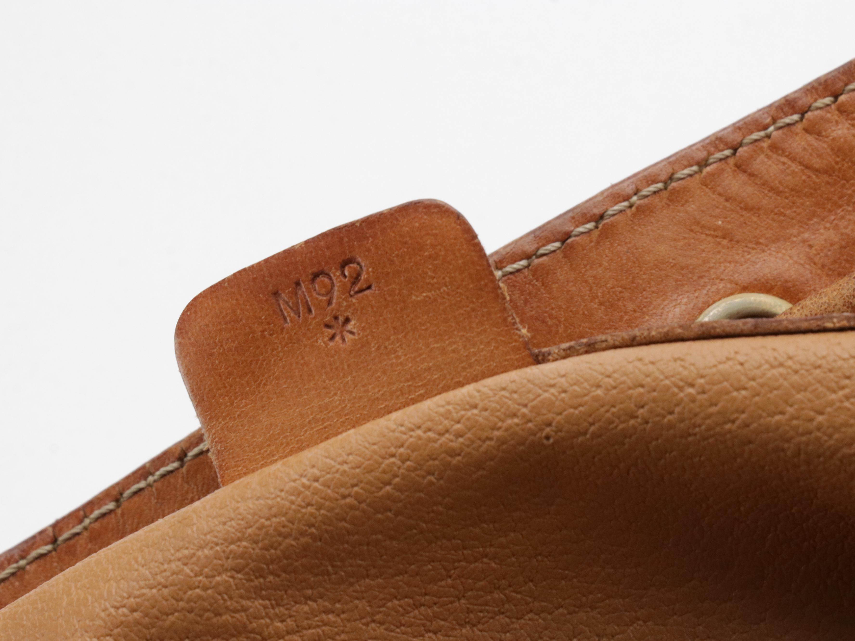 Celine Drawstring Bucket Bag in Macadam Canvas with Leather Trim