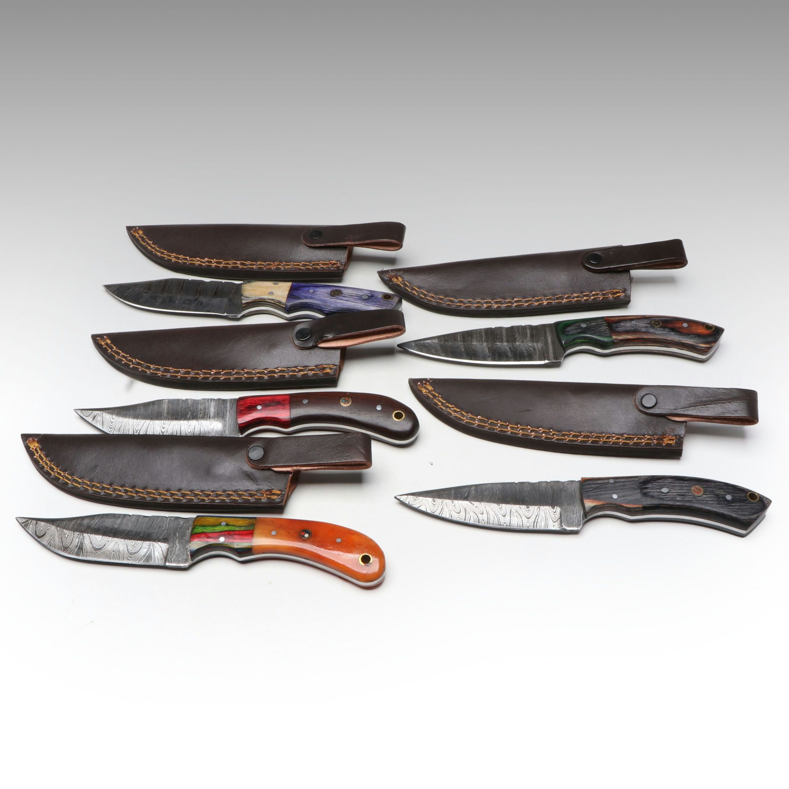 Damascus Steel Hunting Knives in Leather Scabbards