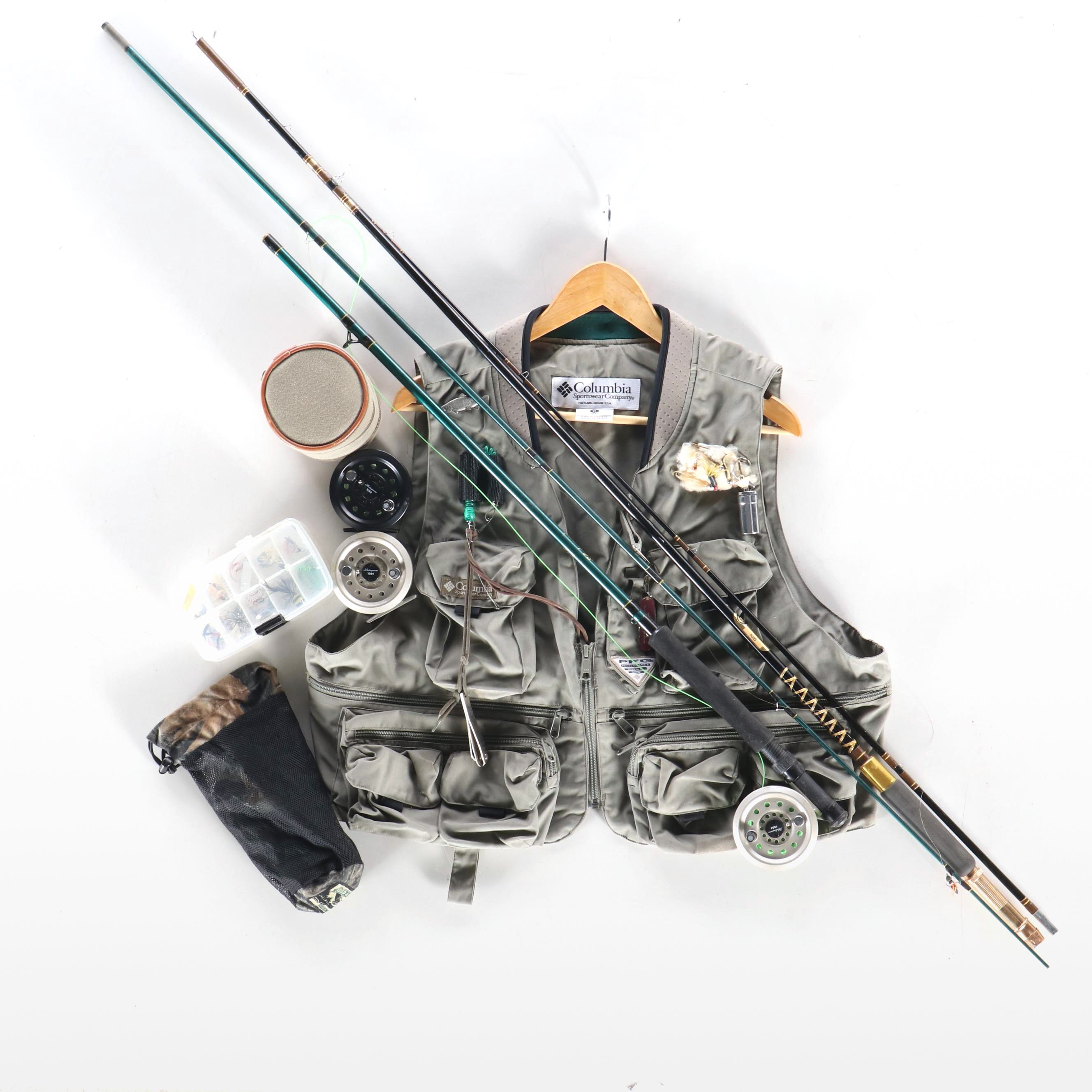 Columbia Fishing Vest with Shakespeare and Other Fishing Poles and Gear