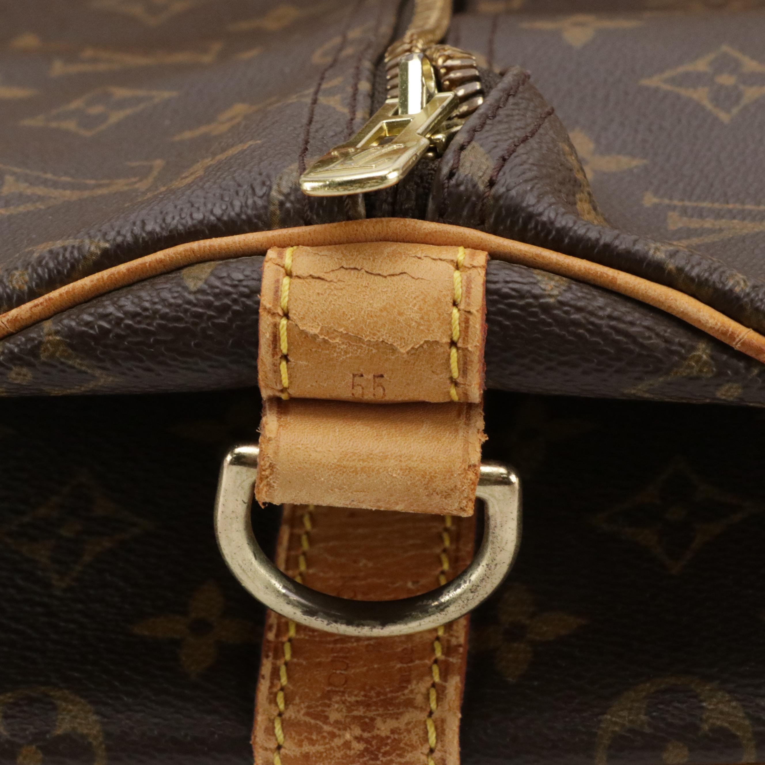 Louis Vuitton Keepall 55 Two-Way Duffle Bag in Monogram Canvas and Leather Trim