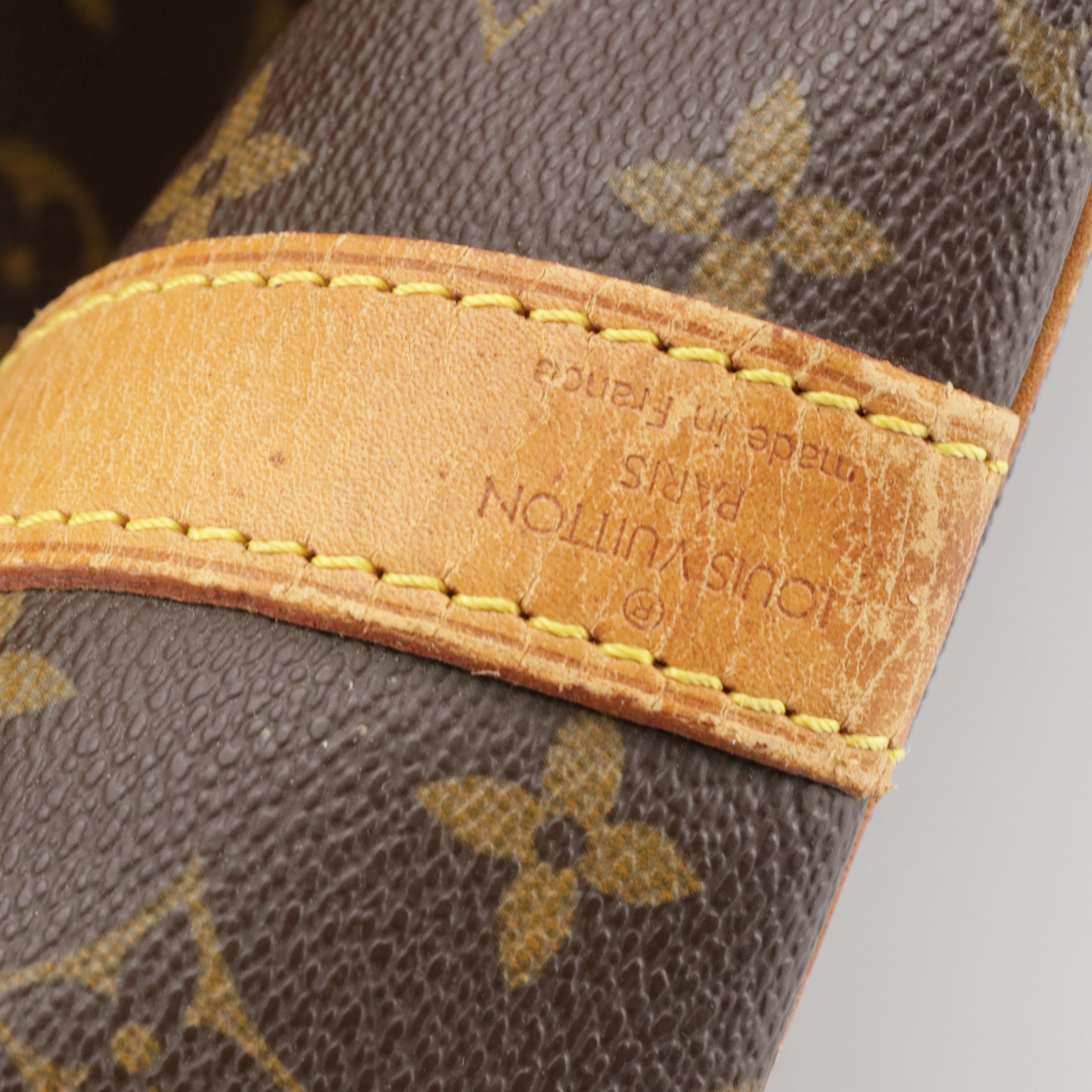 Louis Vuitton Keepall 55 Two-Way Duffle Bag in Monogram Canvas and Leather Trim