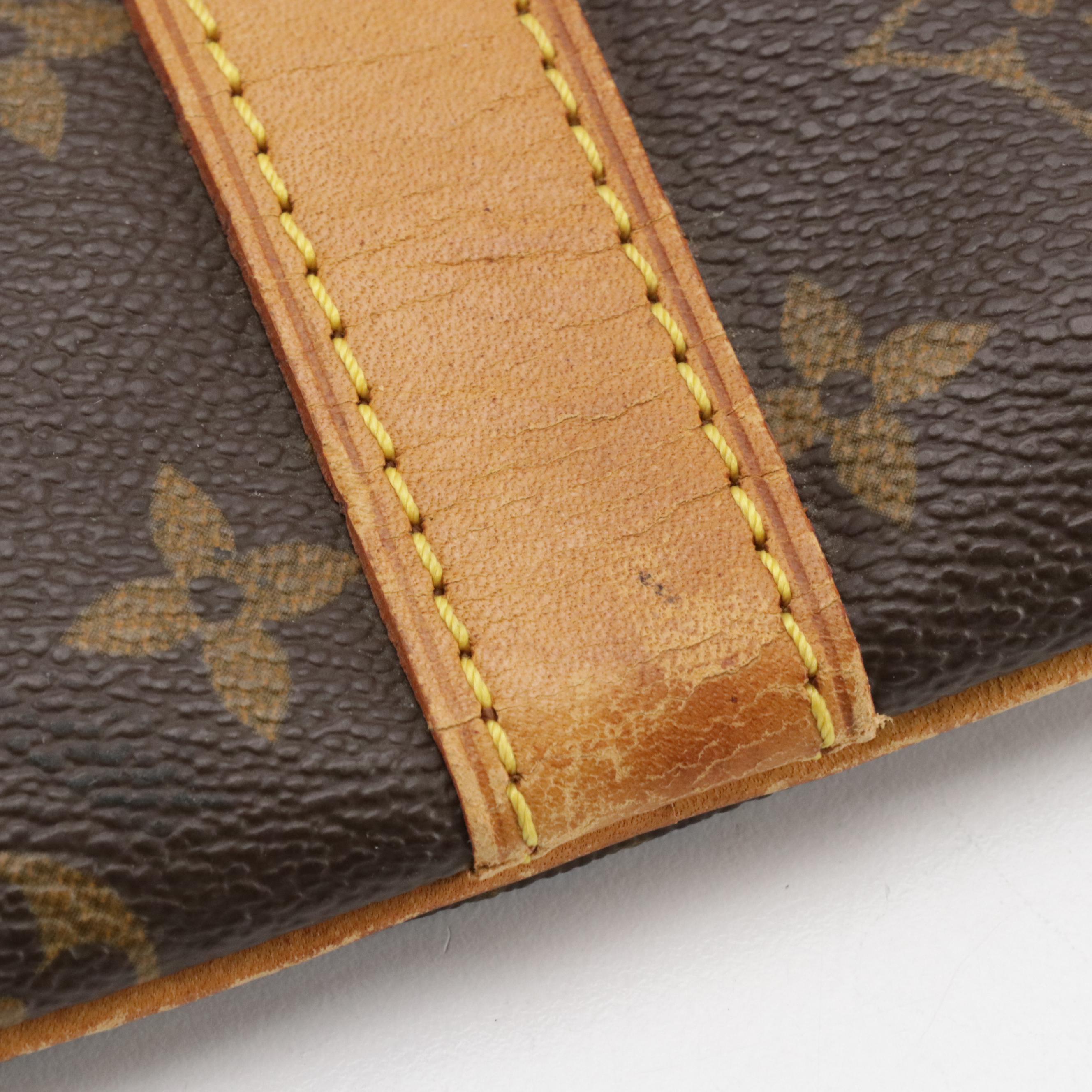 Louis Vuitton Keepall 55 Two-Way Duffle Bag in Monogram Canvas and Leather Trim