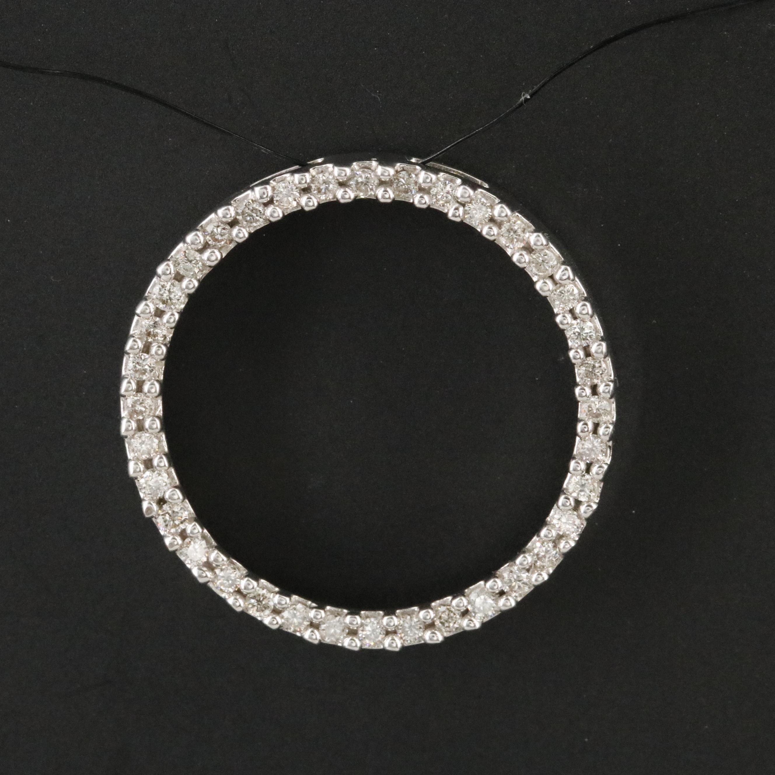 10K 0.47 CTW Diamond Circle Pendant