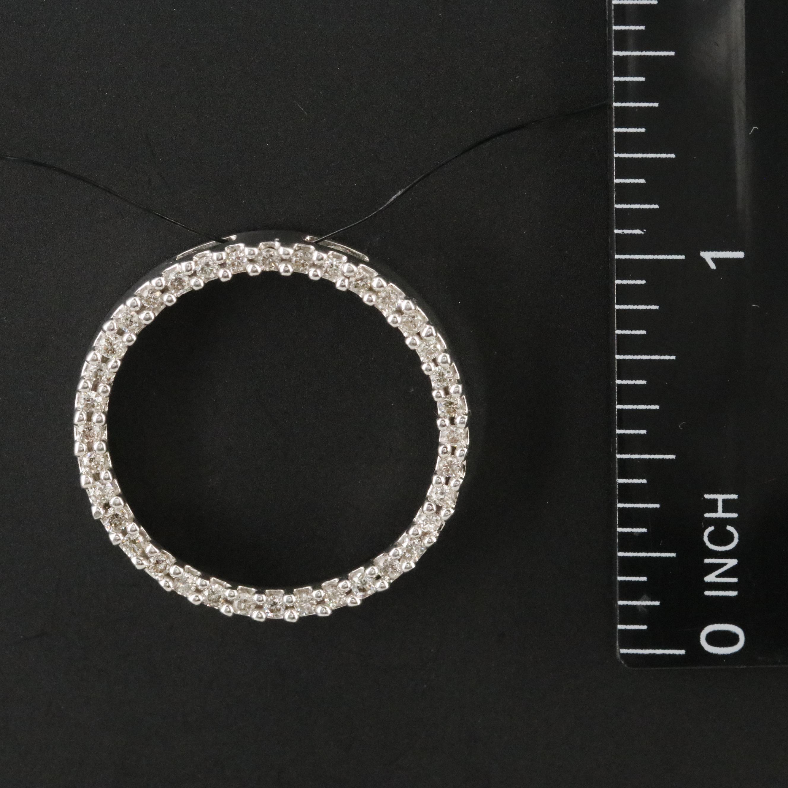 10K 0.47 CTW Diamond Circle Pendant
