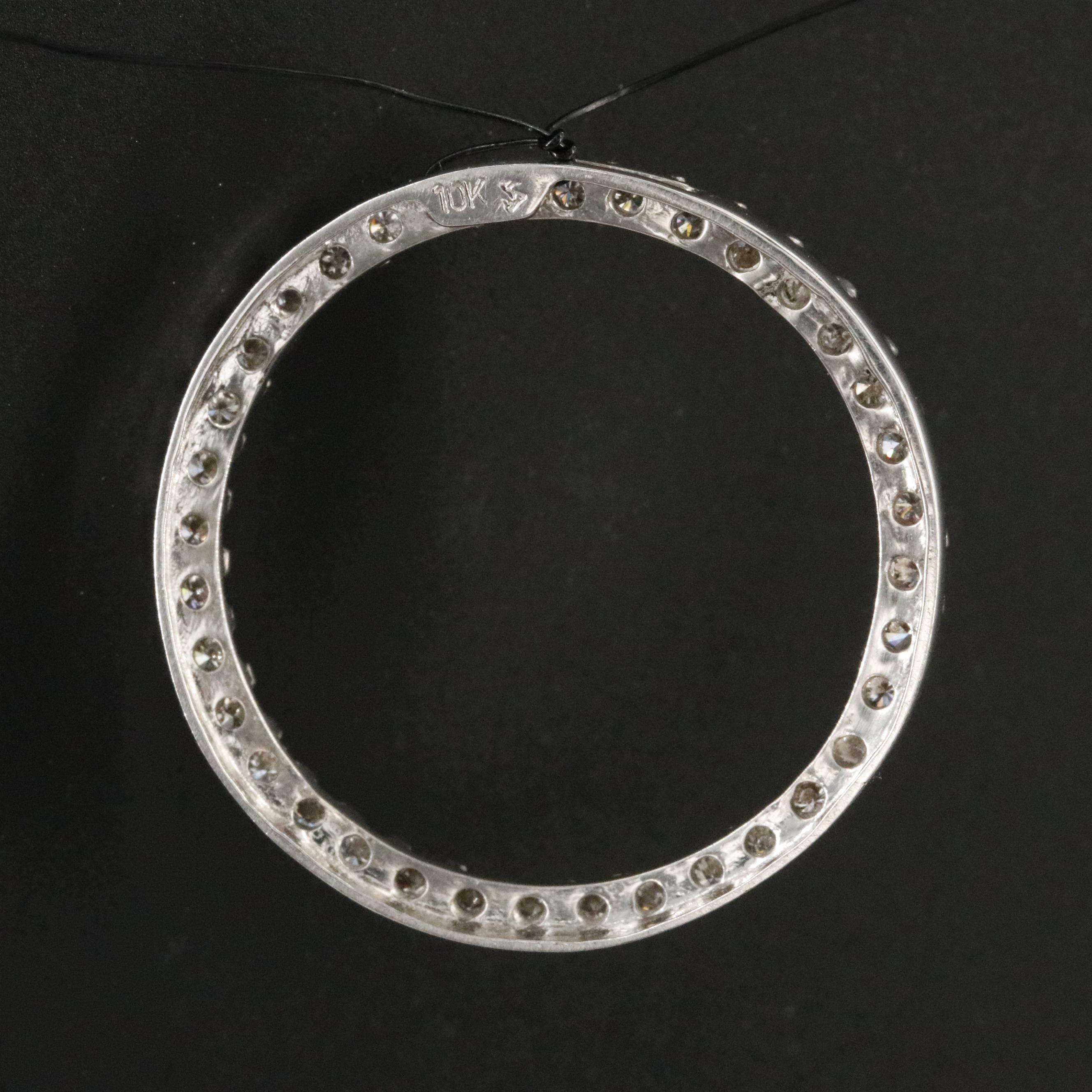 10K 0.47 CTW Diamond Circle Pendant