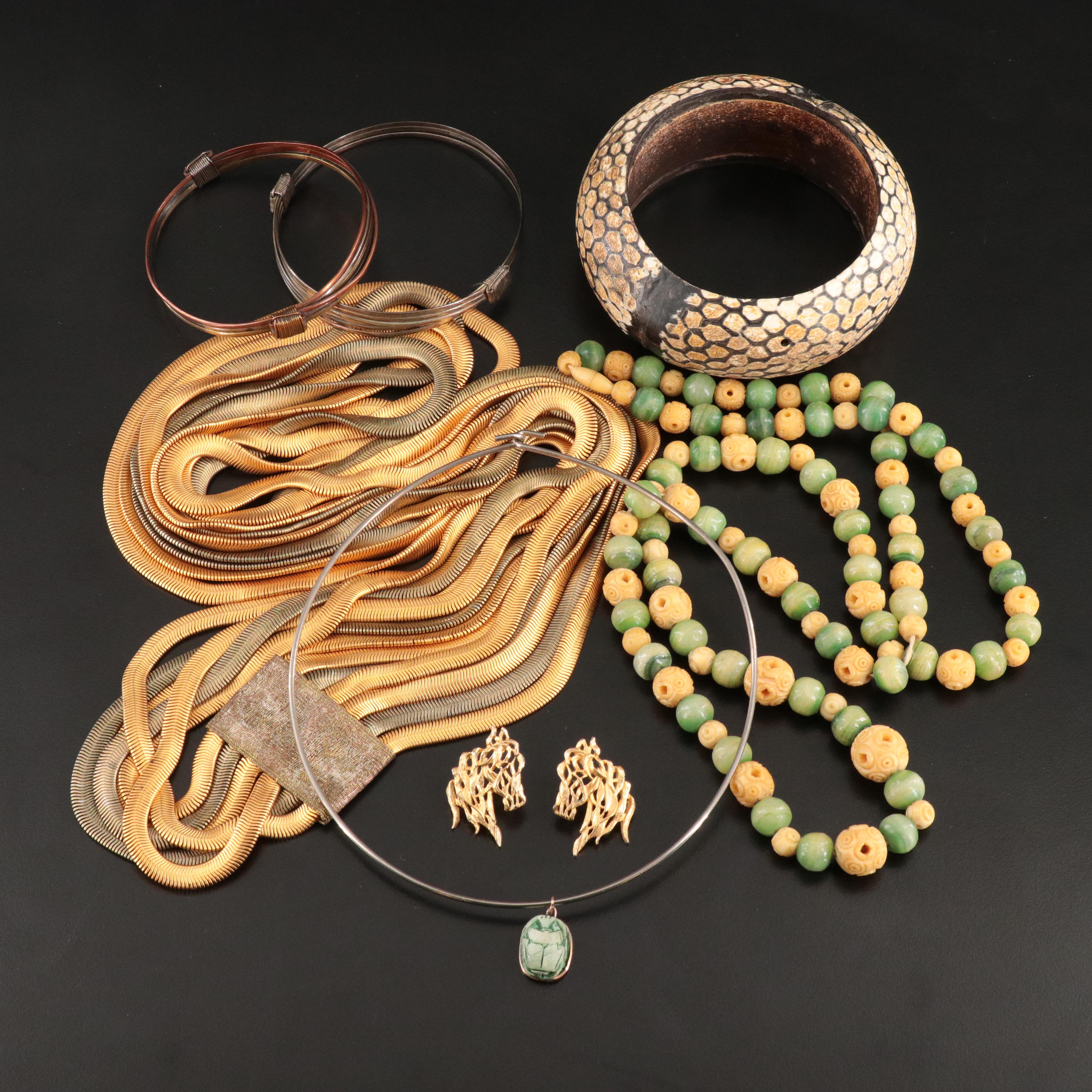 Faience, Bone and Calcite Featured in Jewelry Collection