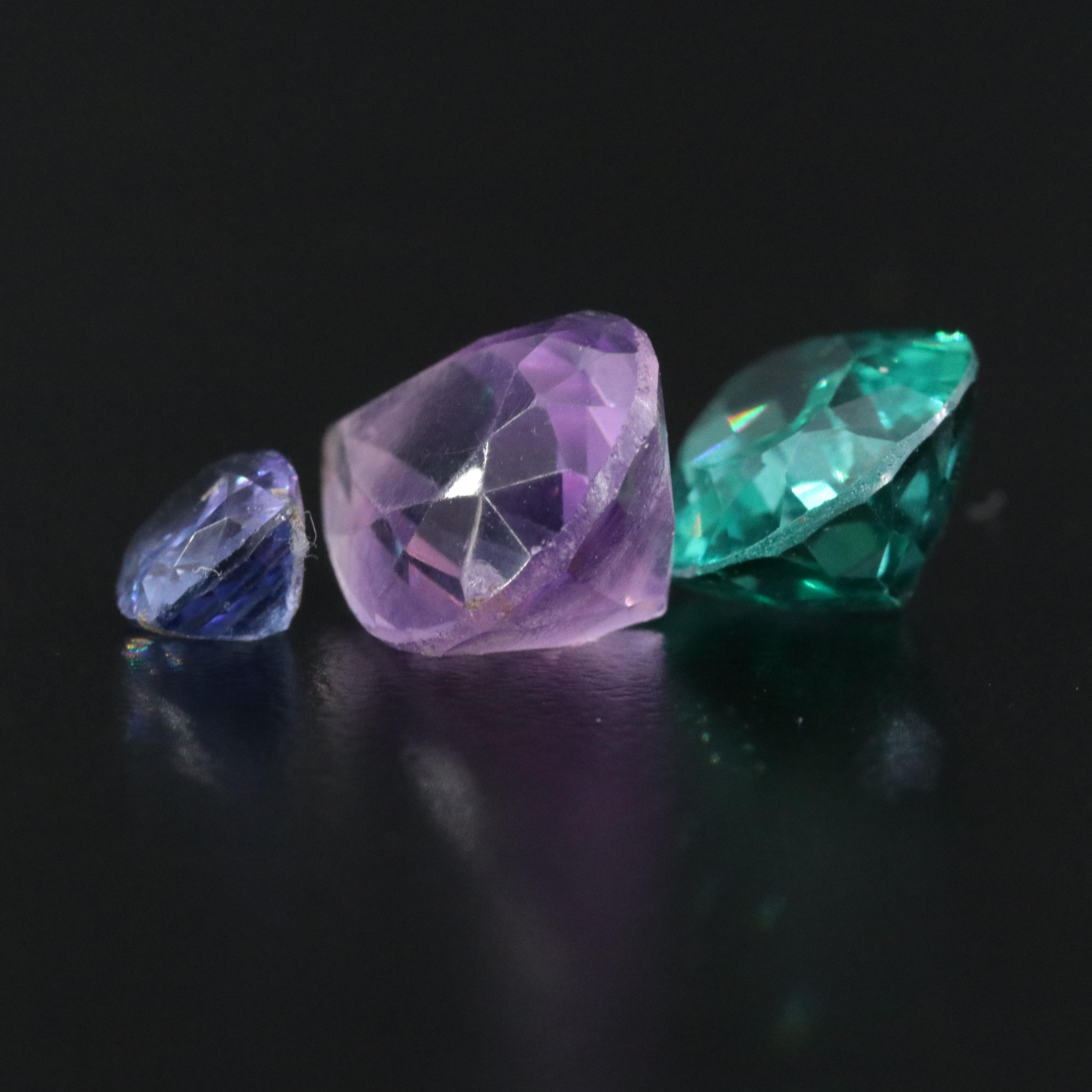 Loose Gemstones Featuring Topaz, Emerald and Amethyst