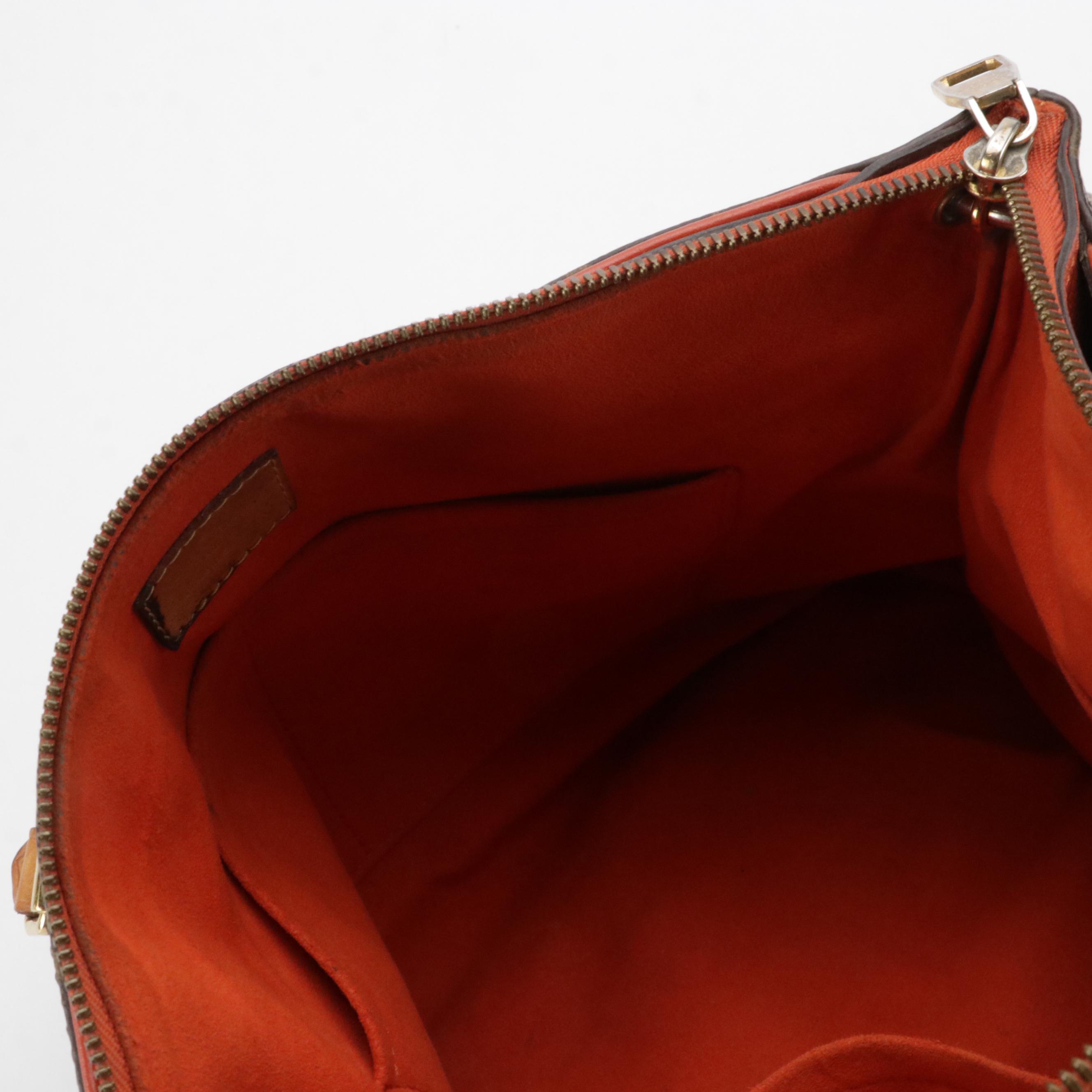 Louis Vuitton Pallas MM Two-Way Bag in Monogram Canvas and Red Leather Accents