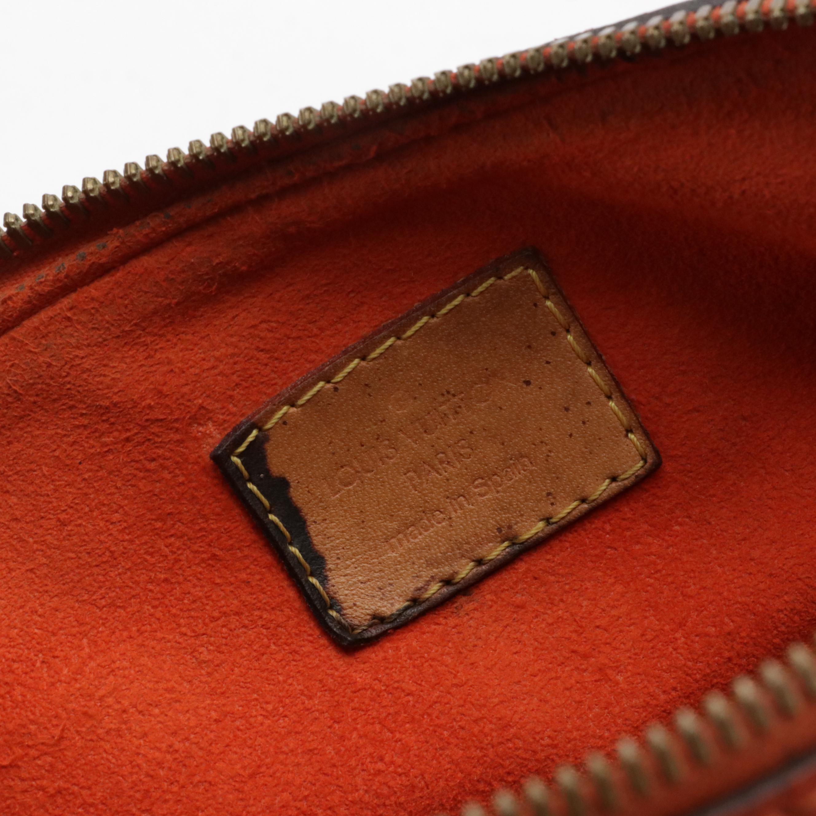 Louis Vuitton Pallas MM Two-Way Bag in Monogram Canvas and Red Leather Accents