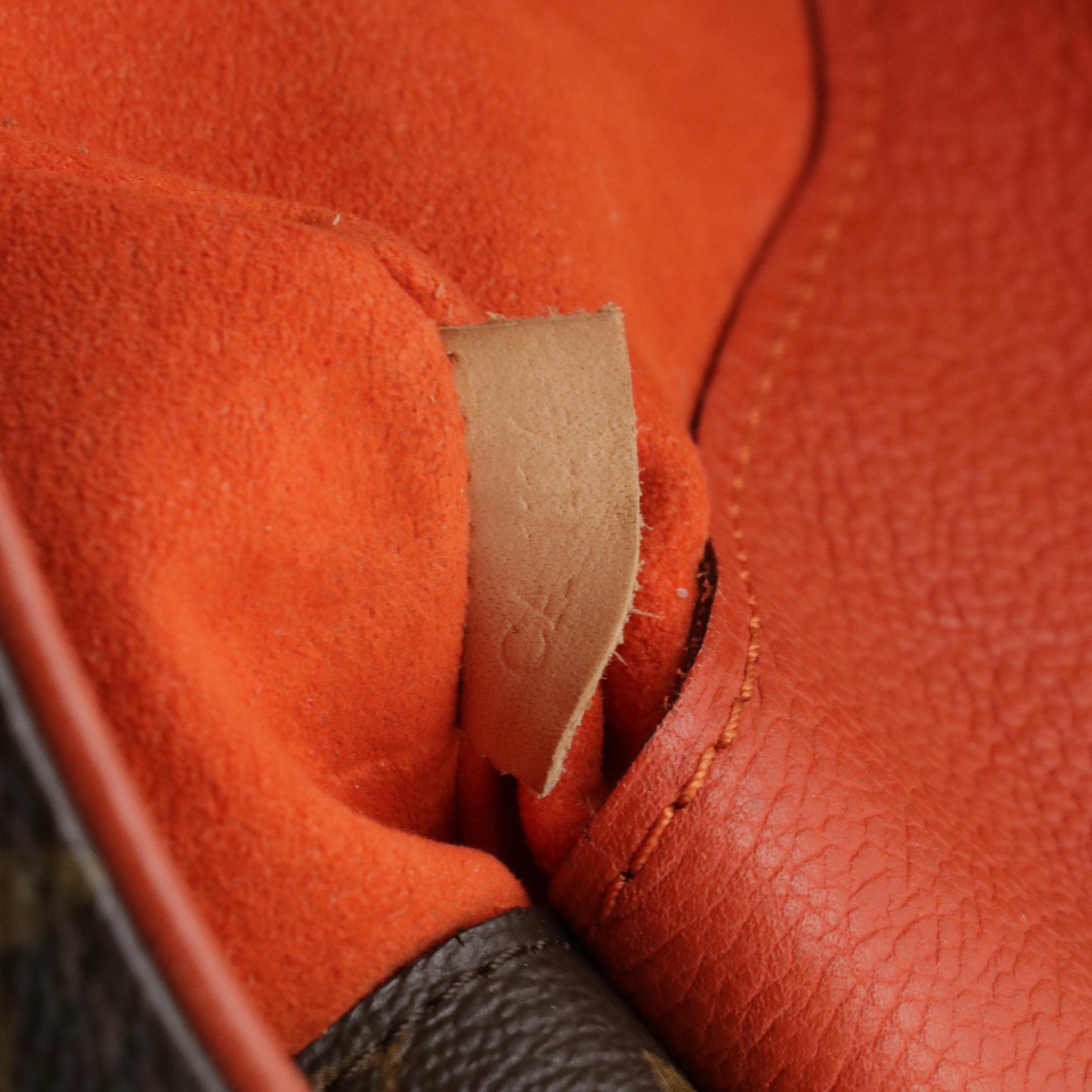 Louis Vuitton Pallas MM Two-Way Bag in Monogram Canvas and Red Leather Accents