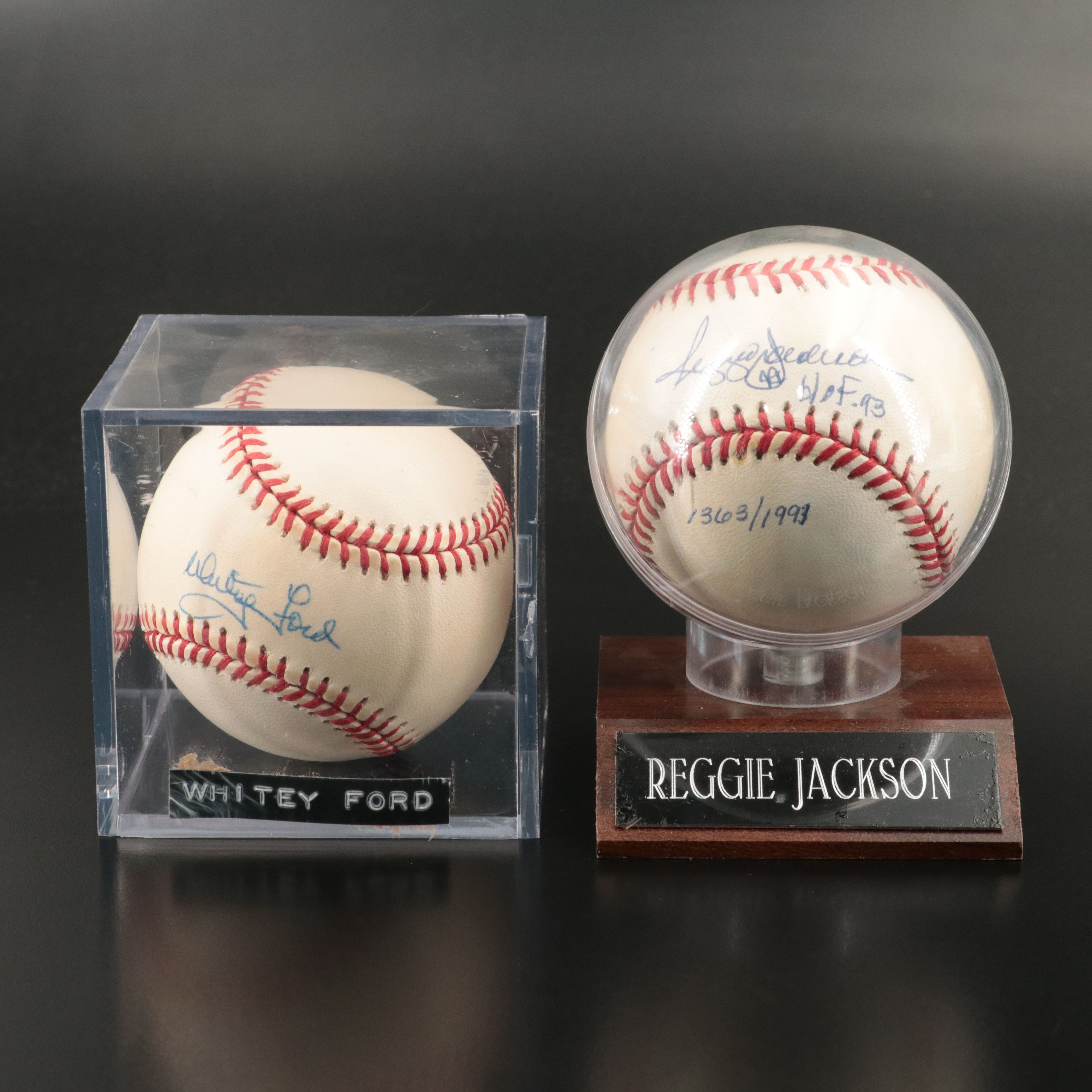 Two Signed Baseballs by Whitey Ford and Reggie Jackson, HOF