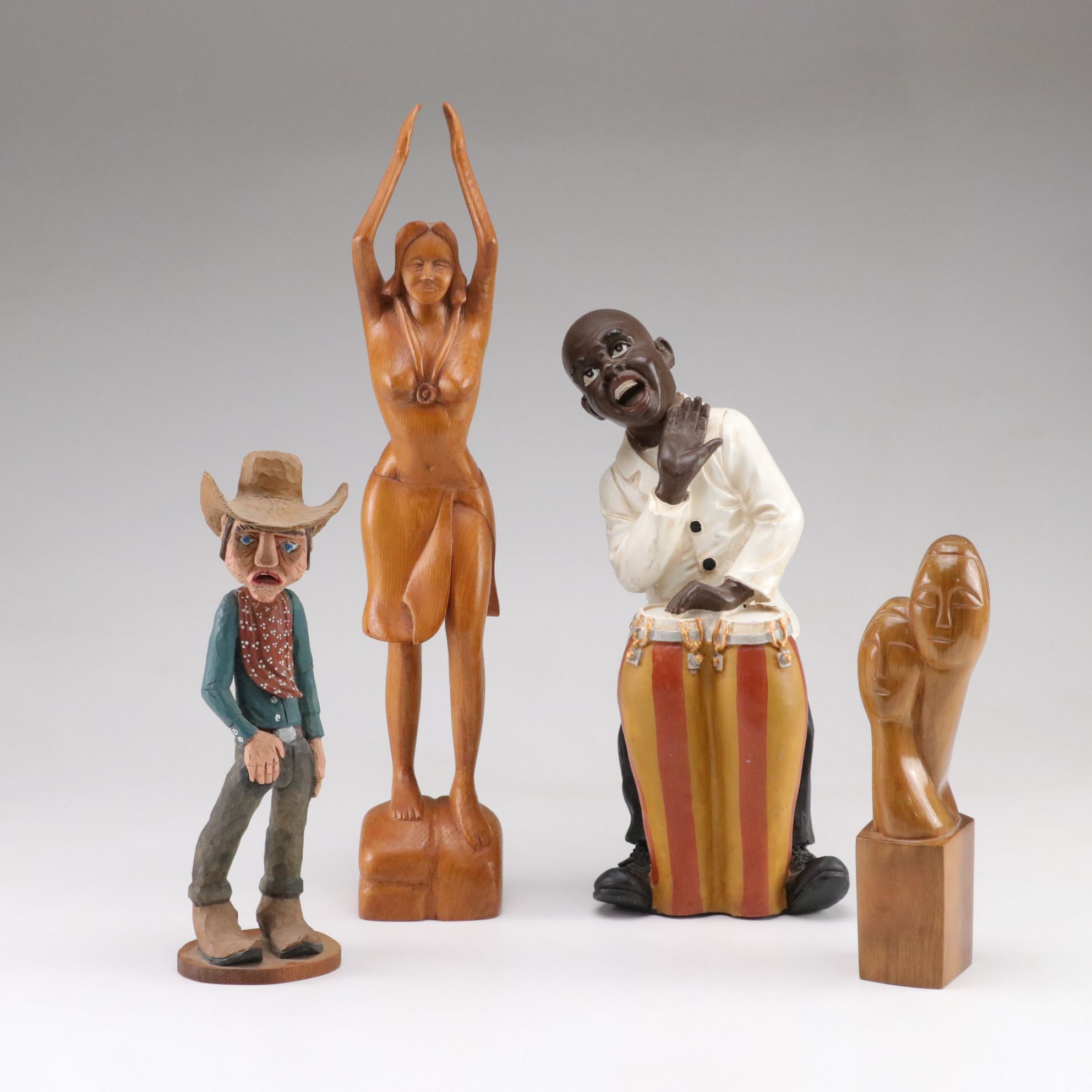 Hand-Crafted Cowboy and Other Wood Sculptures