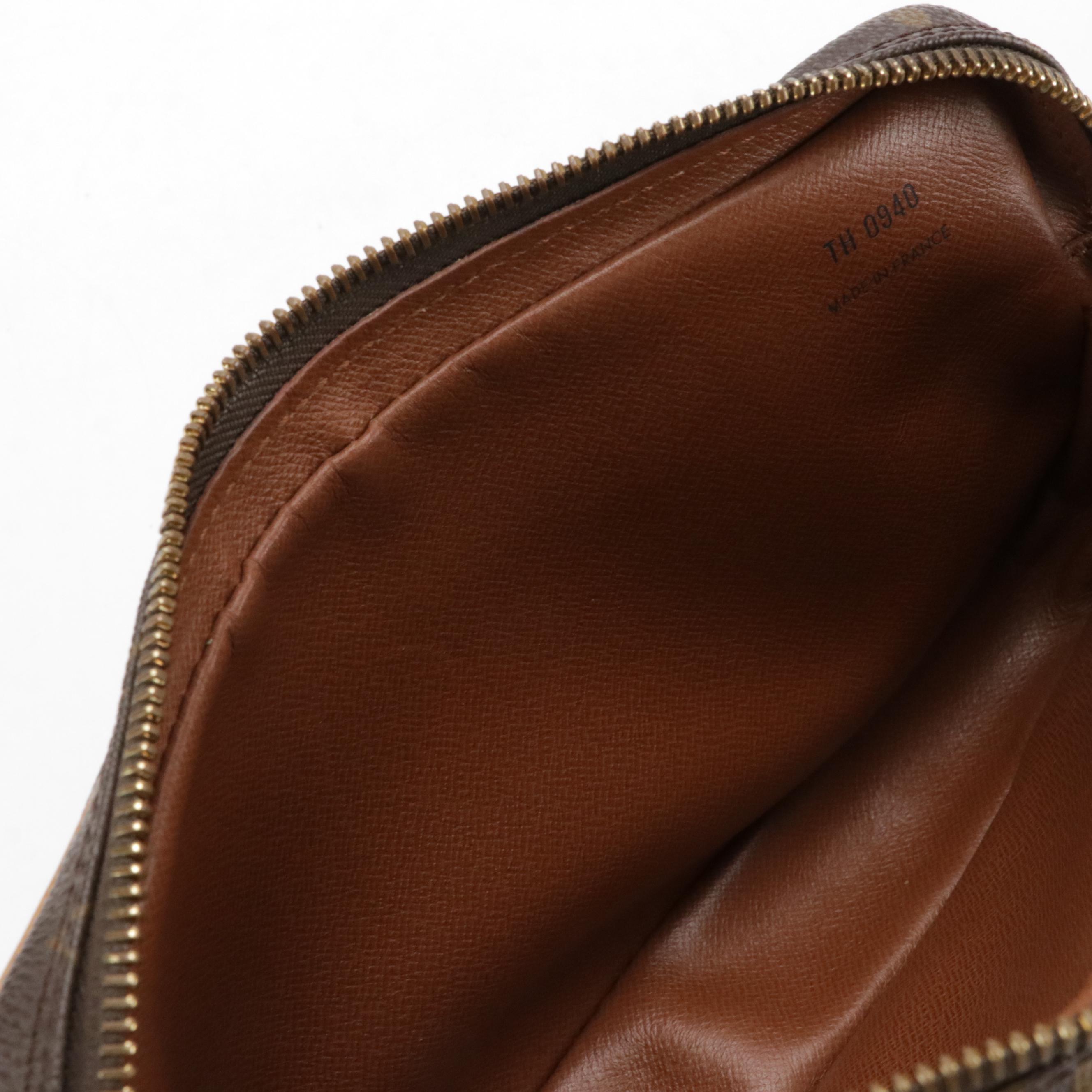 Louis Vuitton Marly Dragonne Wristlet Clutch in Monogram Canvas and Leather Trim