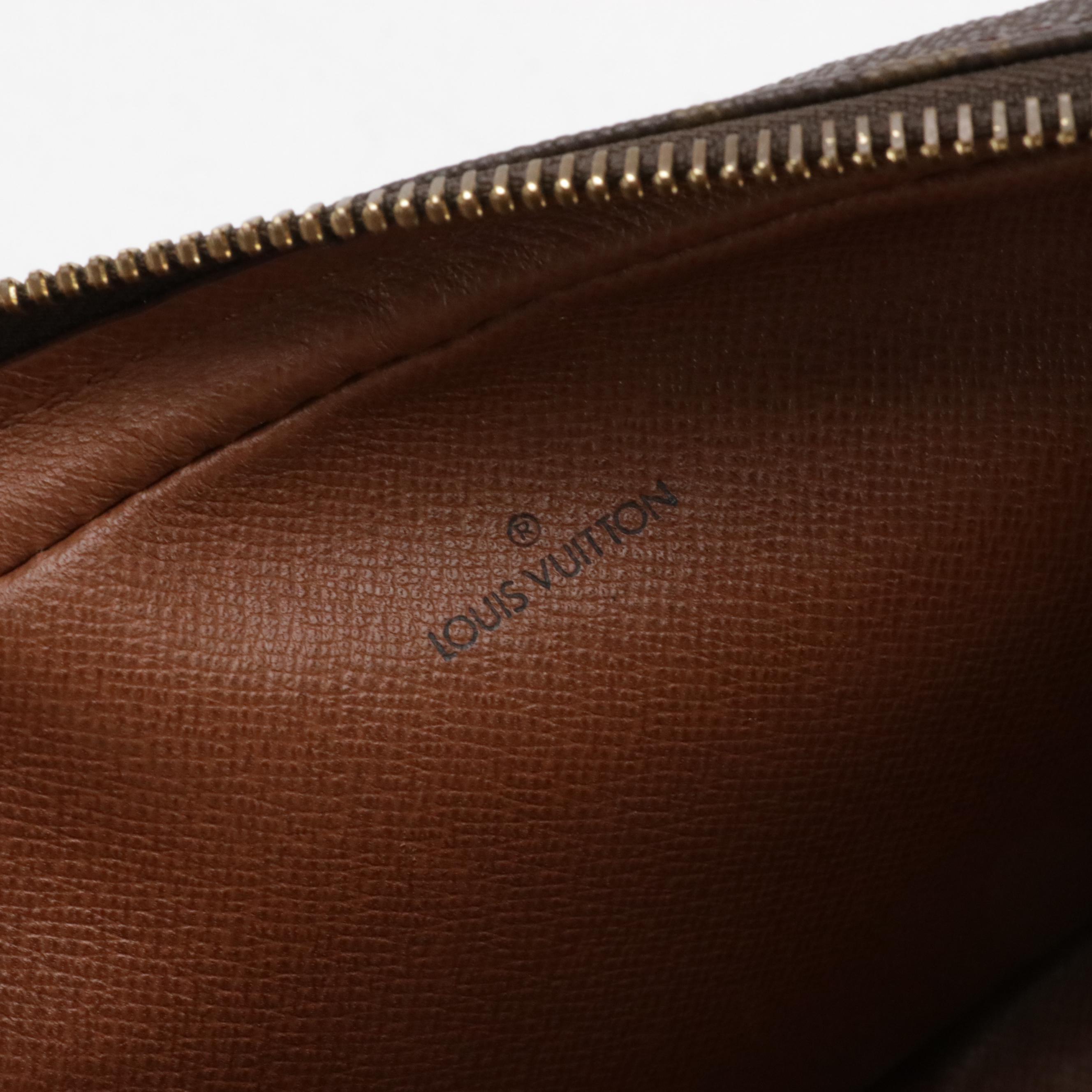 Louis Vuitton Marly Dragonne Wristlet Clutch in Monogram Canvas and Leather Trim