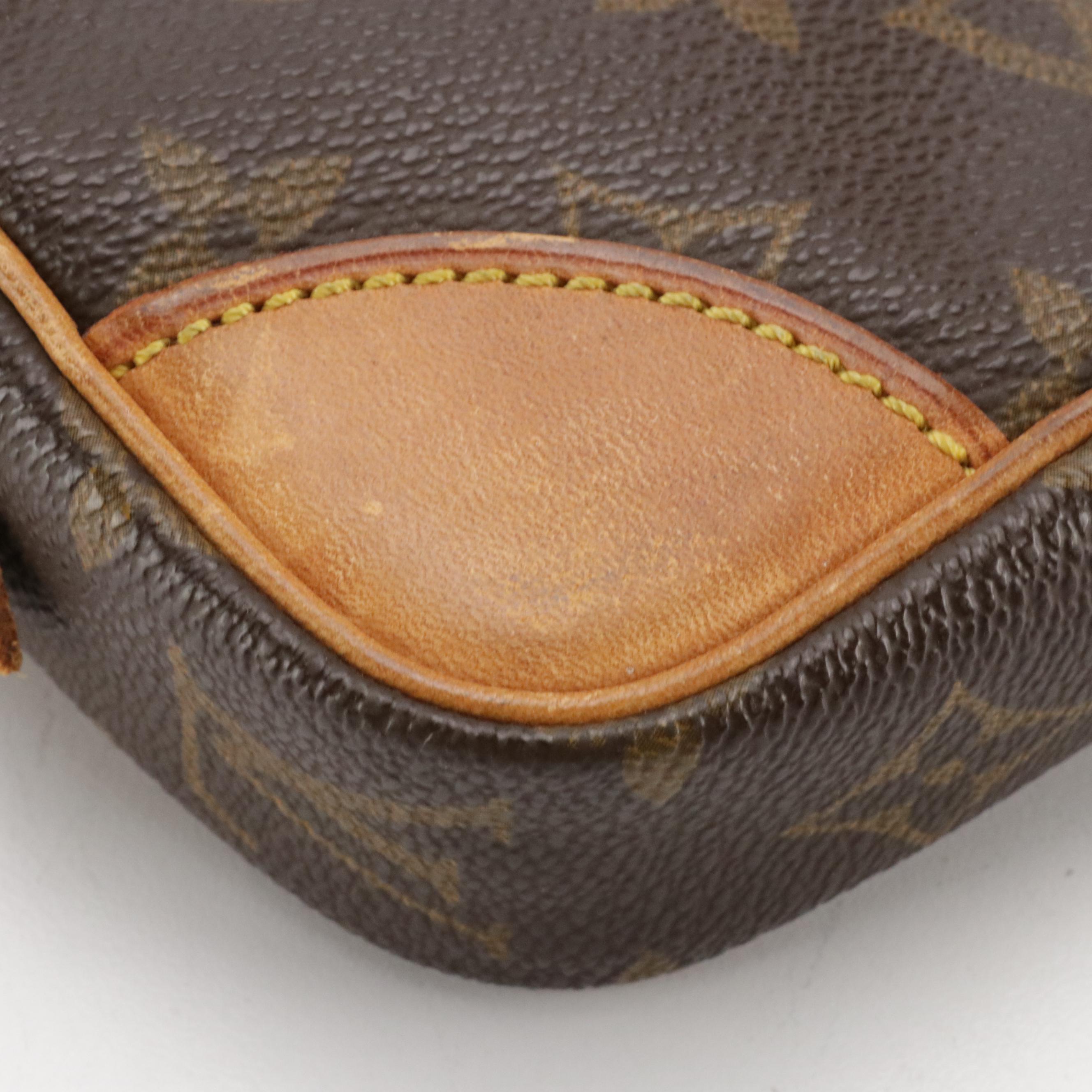 Louis Vuitton Marly Dragonne Wristlet Clutch in Monogram Canvas and Leather Trim