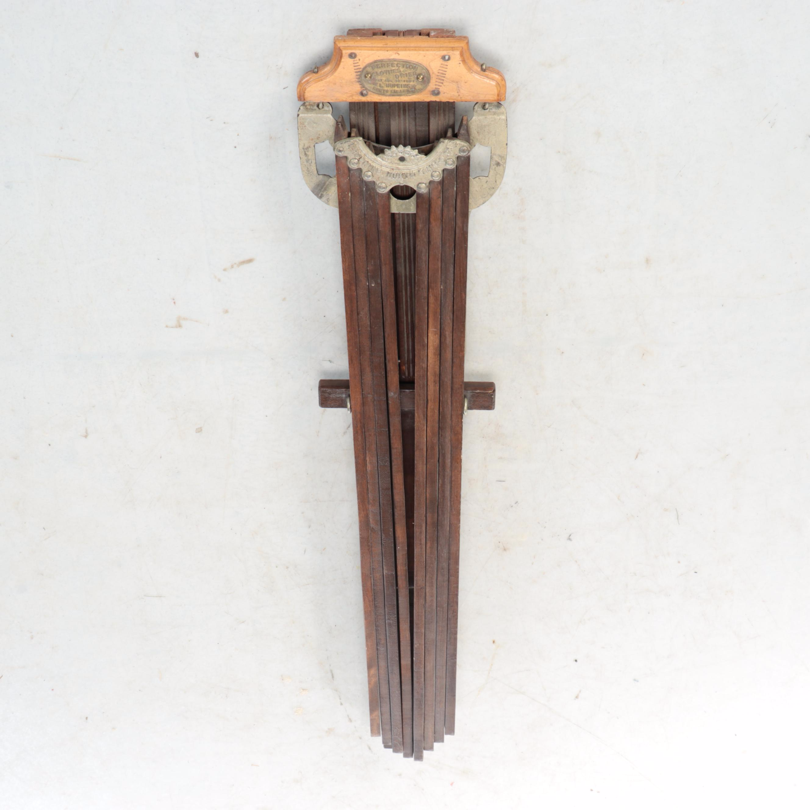 L. Hopkins Wood and Cast Iron Wall Mount Collapsible Laundry Rack, Early 20th C.