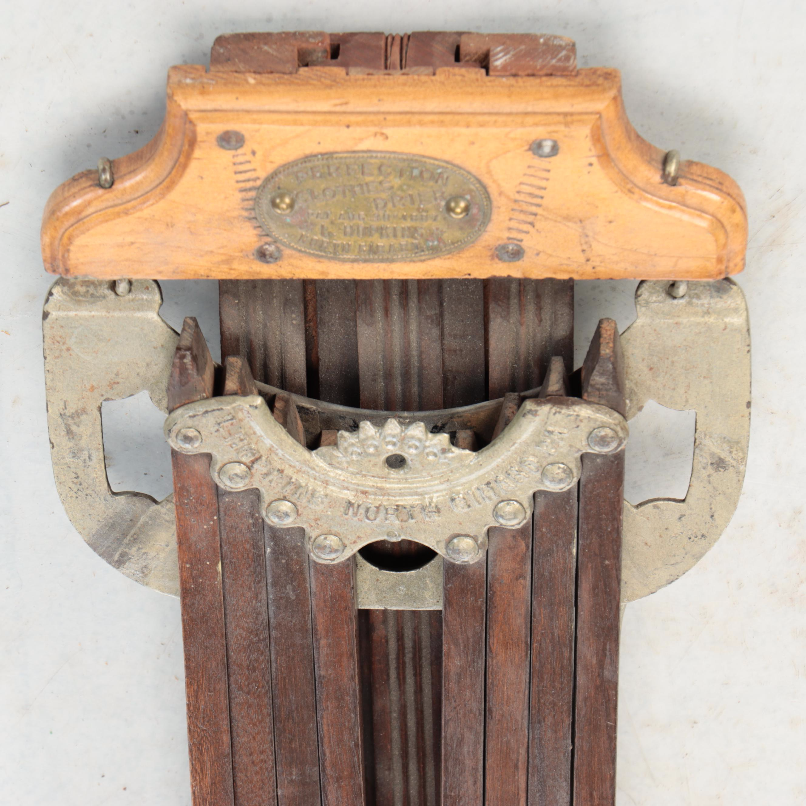 L. Hopkins Wood and Cast Iron Wall Mount Collapsible Laundry Rack, Early 20th C.