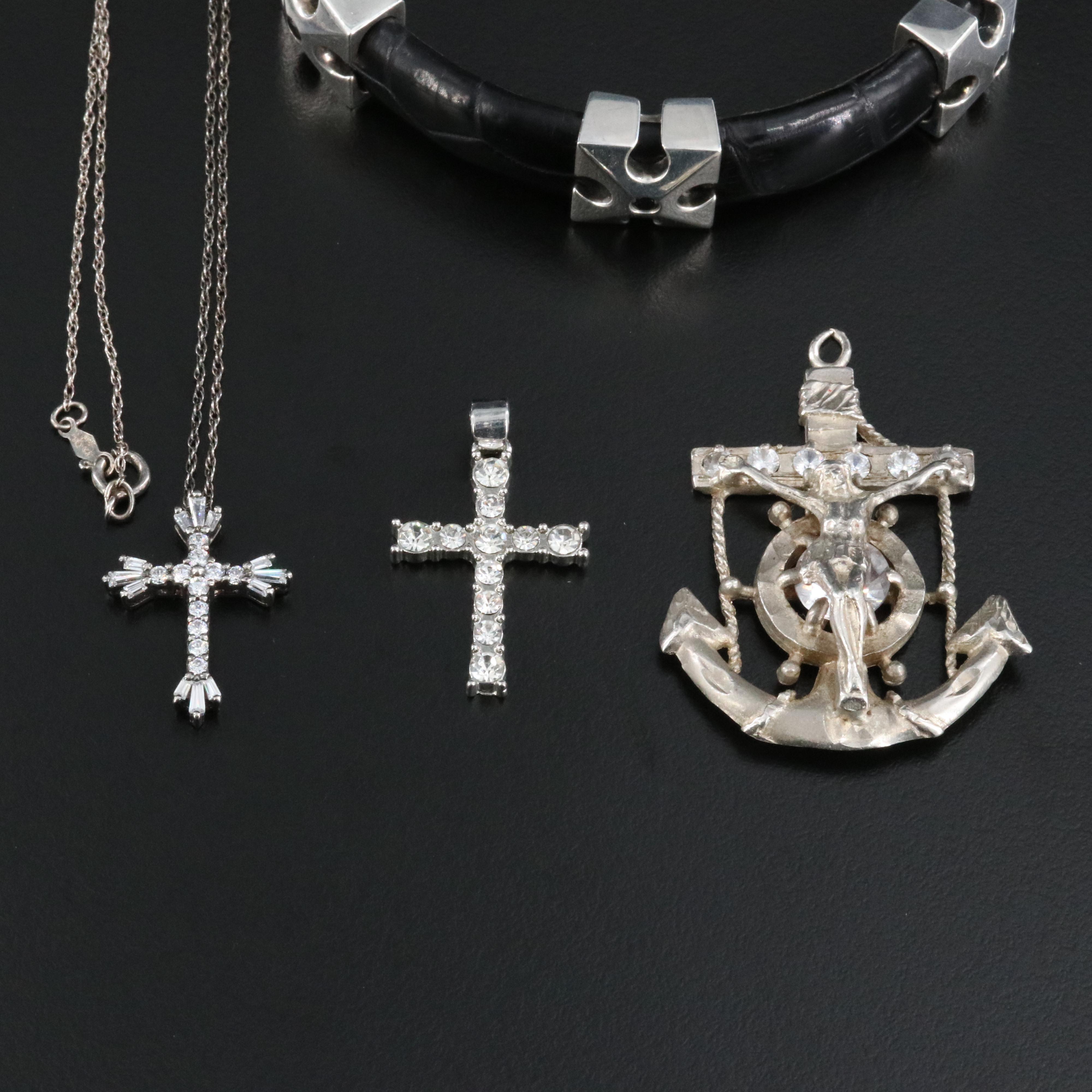 Collection of Religious Iconography Jewelry Featuring Sterling and CZ