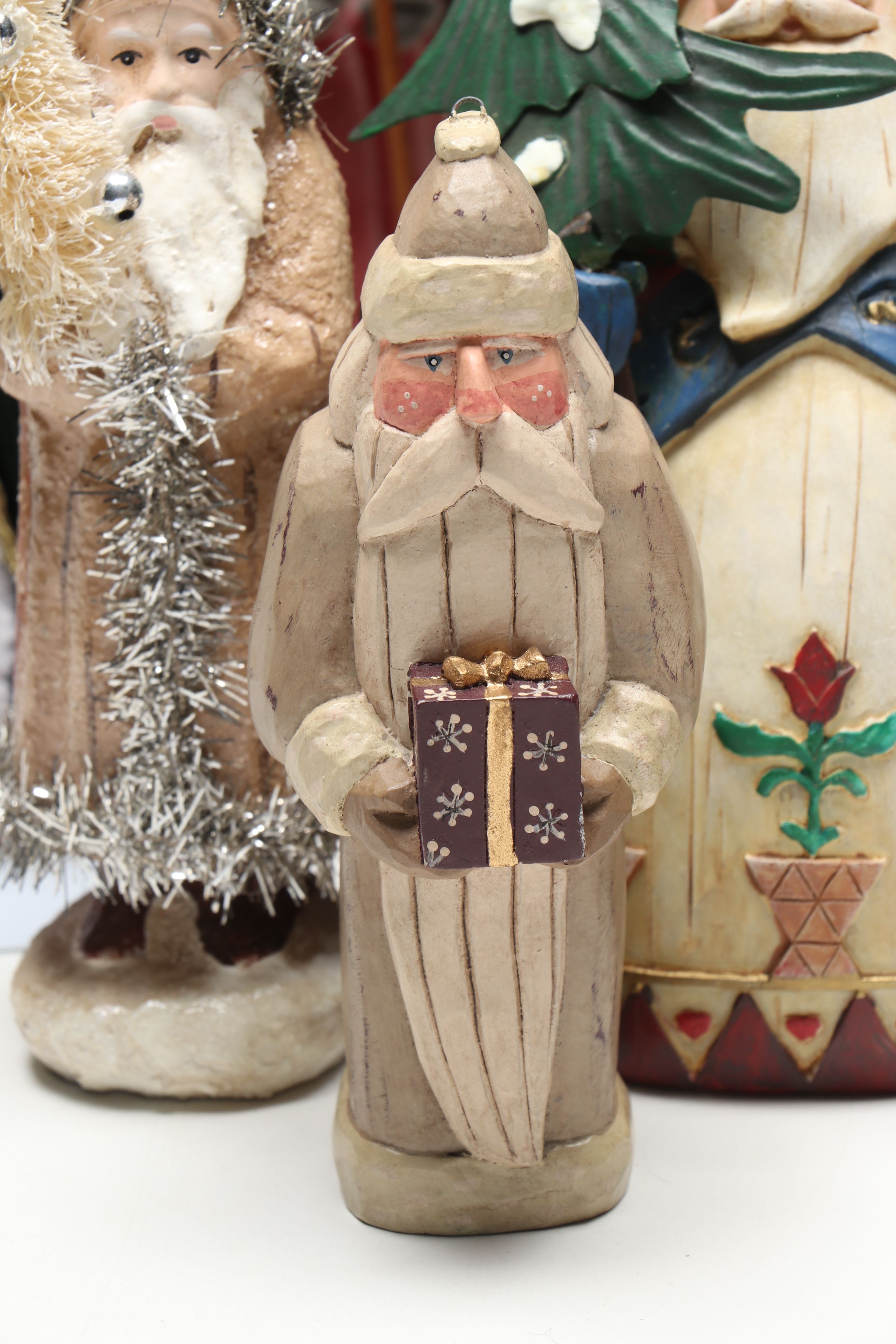 St. Nicholas Square and Other Resin Santa Claus Figurines