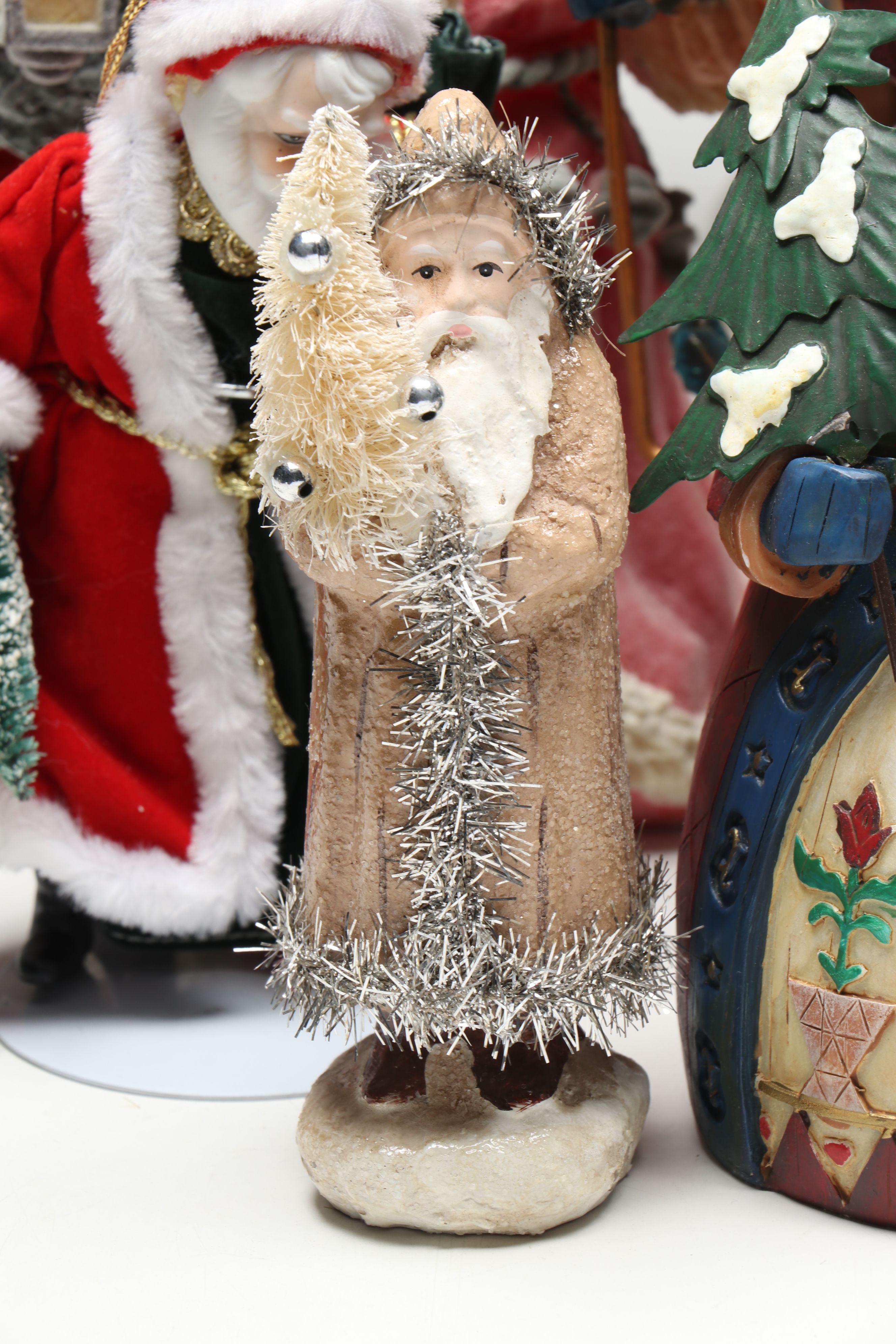 St. Nicholas Square and Other Resin Santa Claus Figurines
