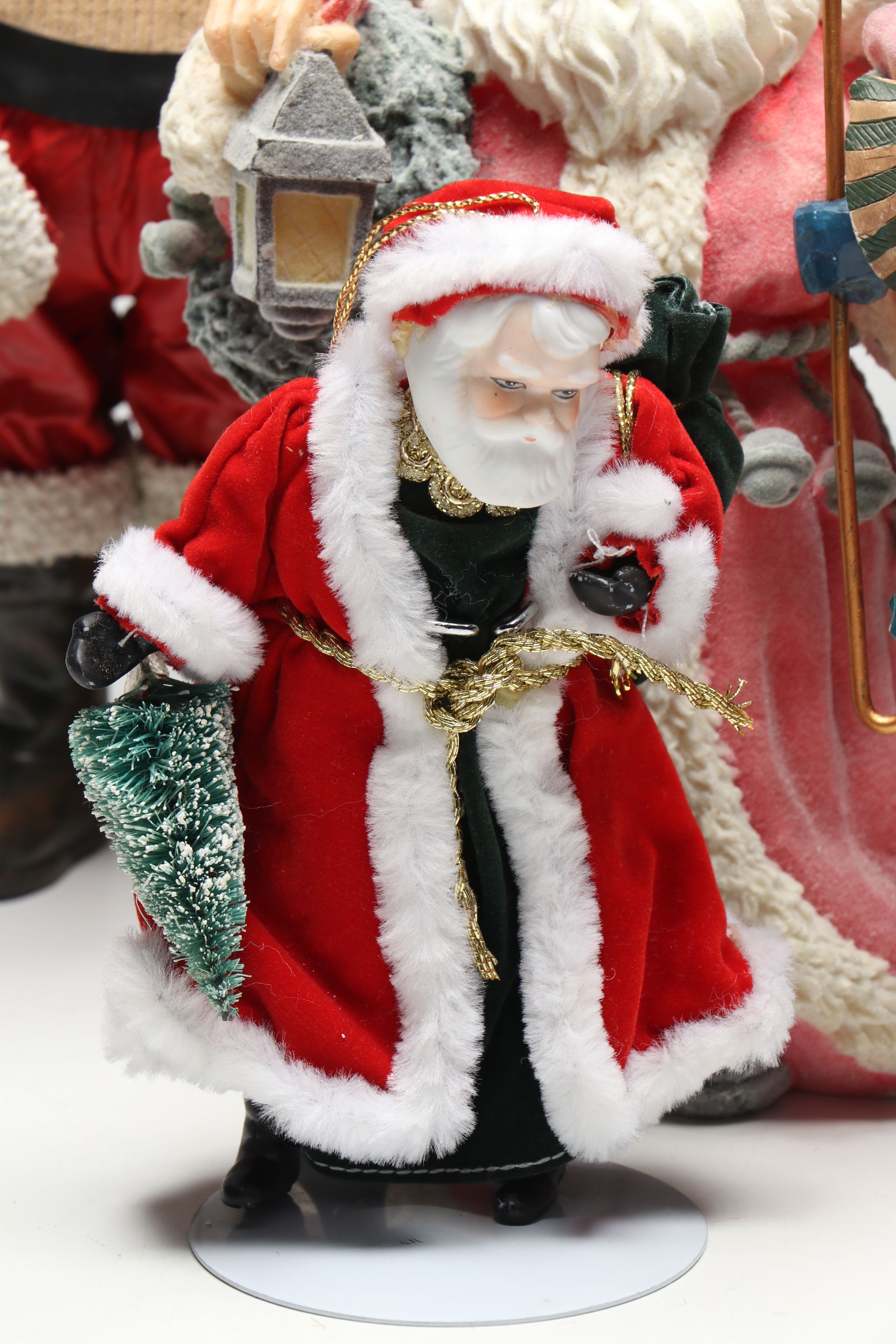 St. Nicholas Square and Other Resin Santa Claus Figurines