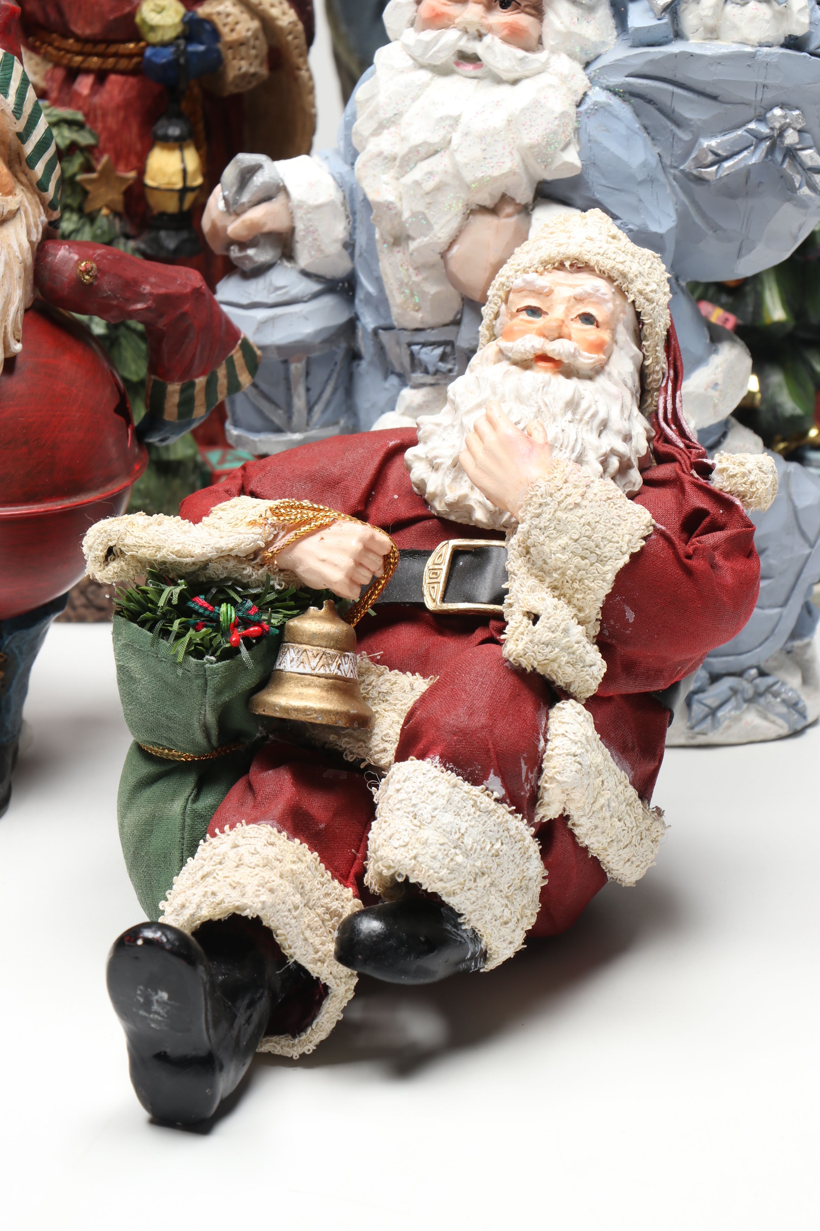 St. Nicholas Square and Other Resin Santa Claus Figurines
