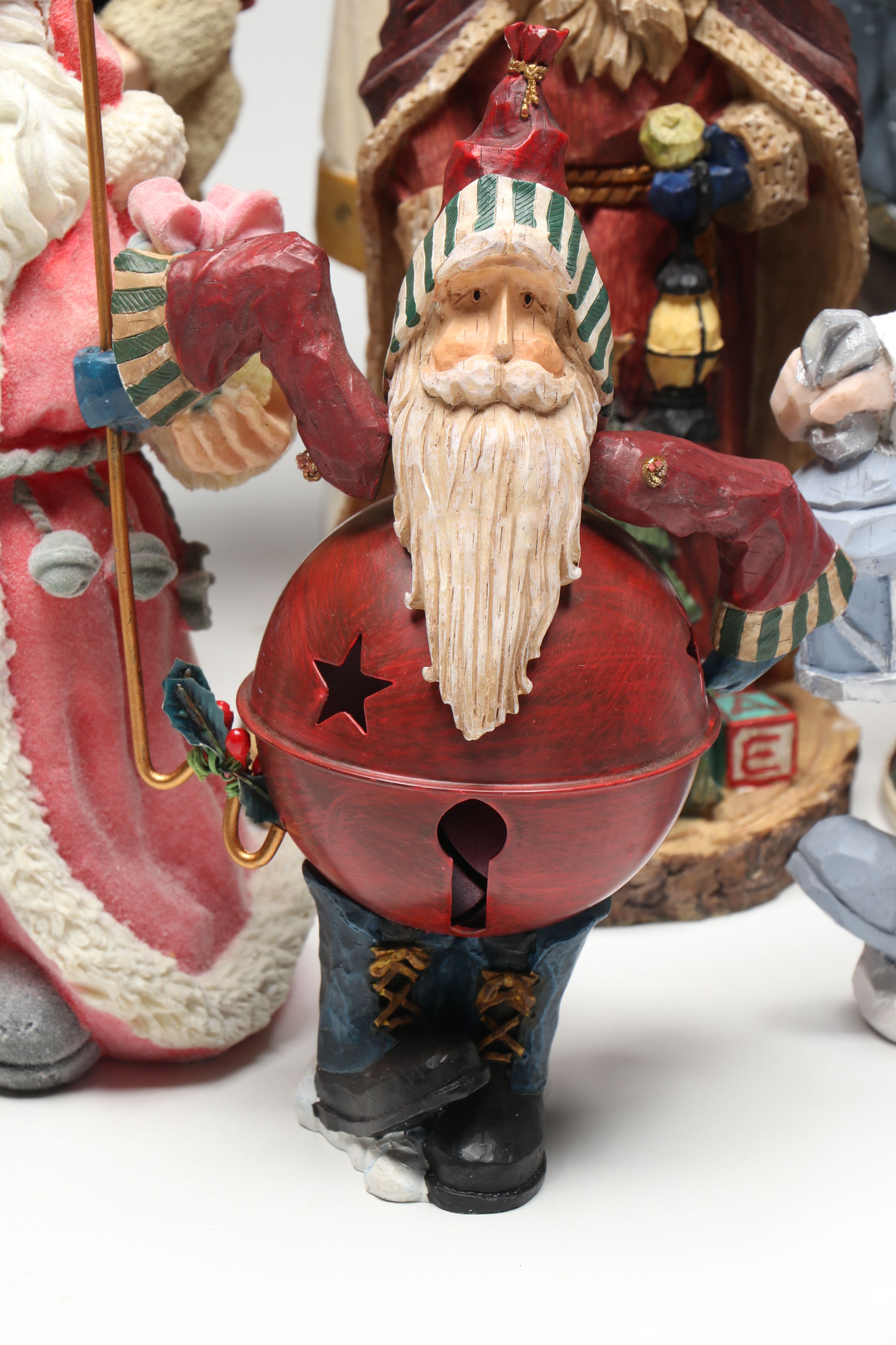 St. Nicholas Square and Other Resin Santa Claus Figurines