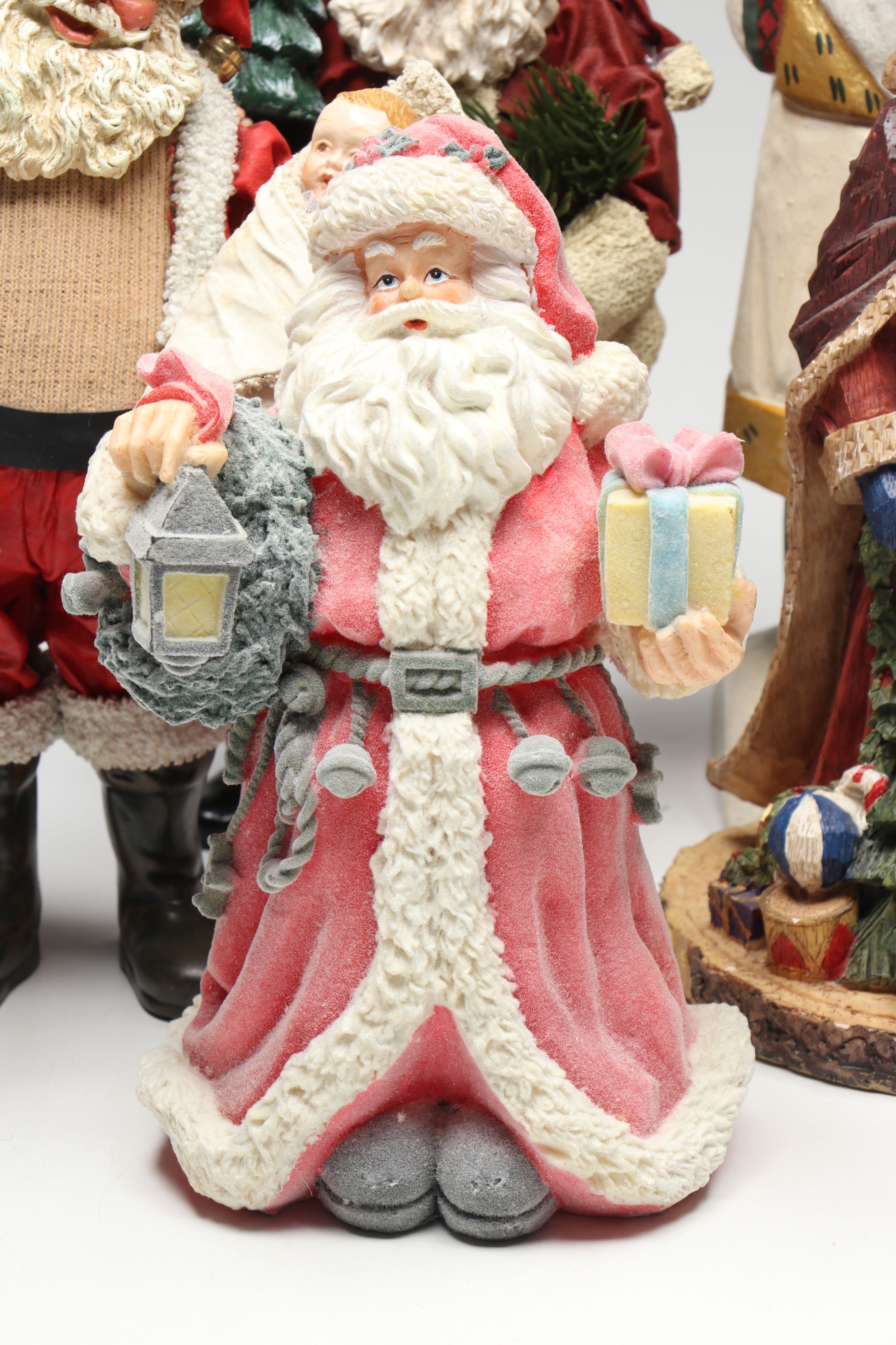 St. Nicholas Square and Other Resin Santa Claus Figurines