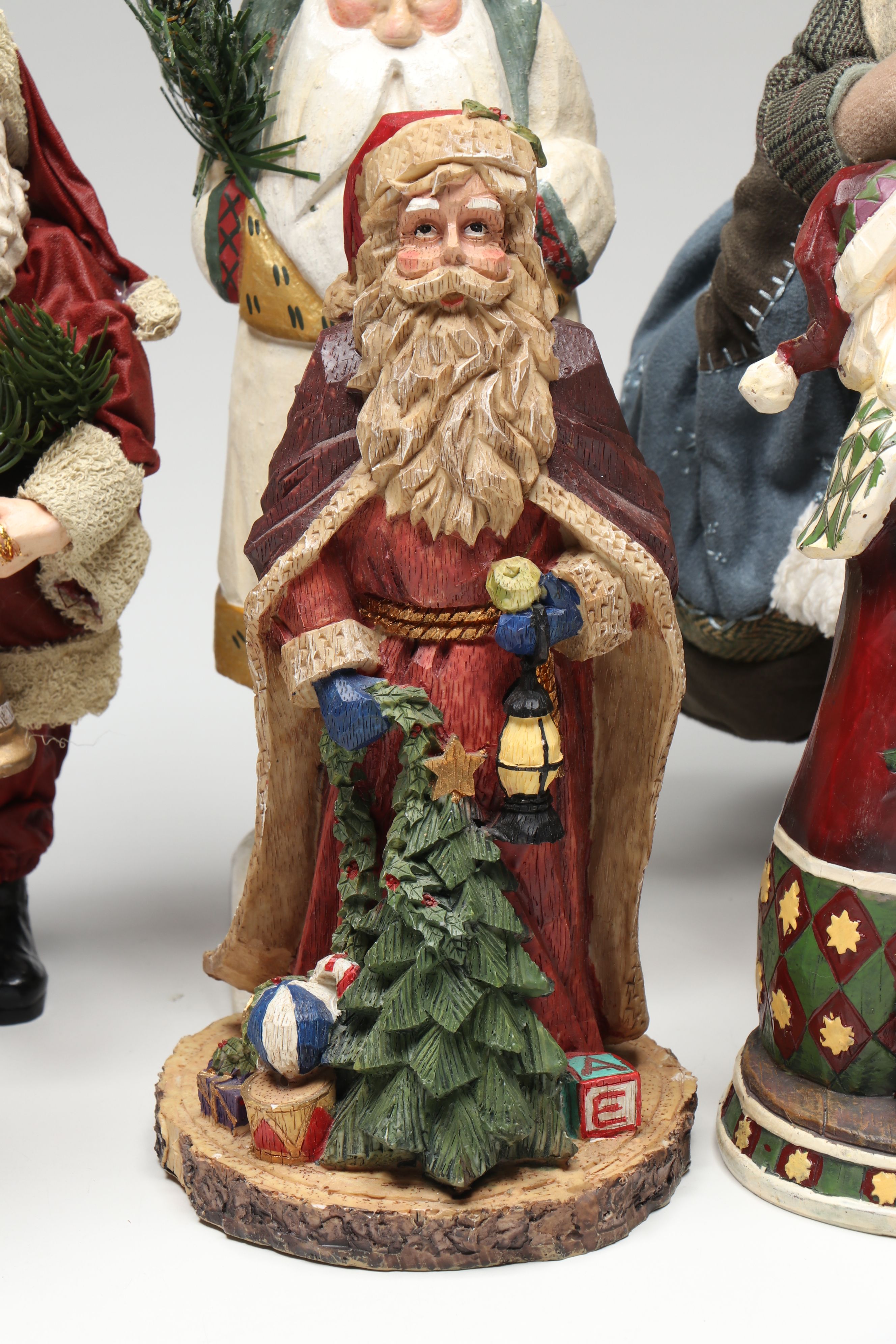 St. Nicholas Square and Other Resin Santa Claus Figurines