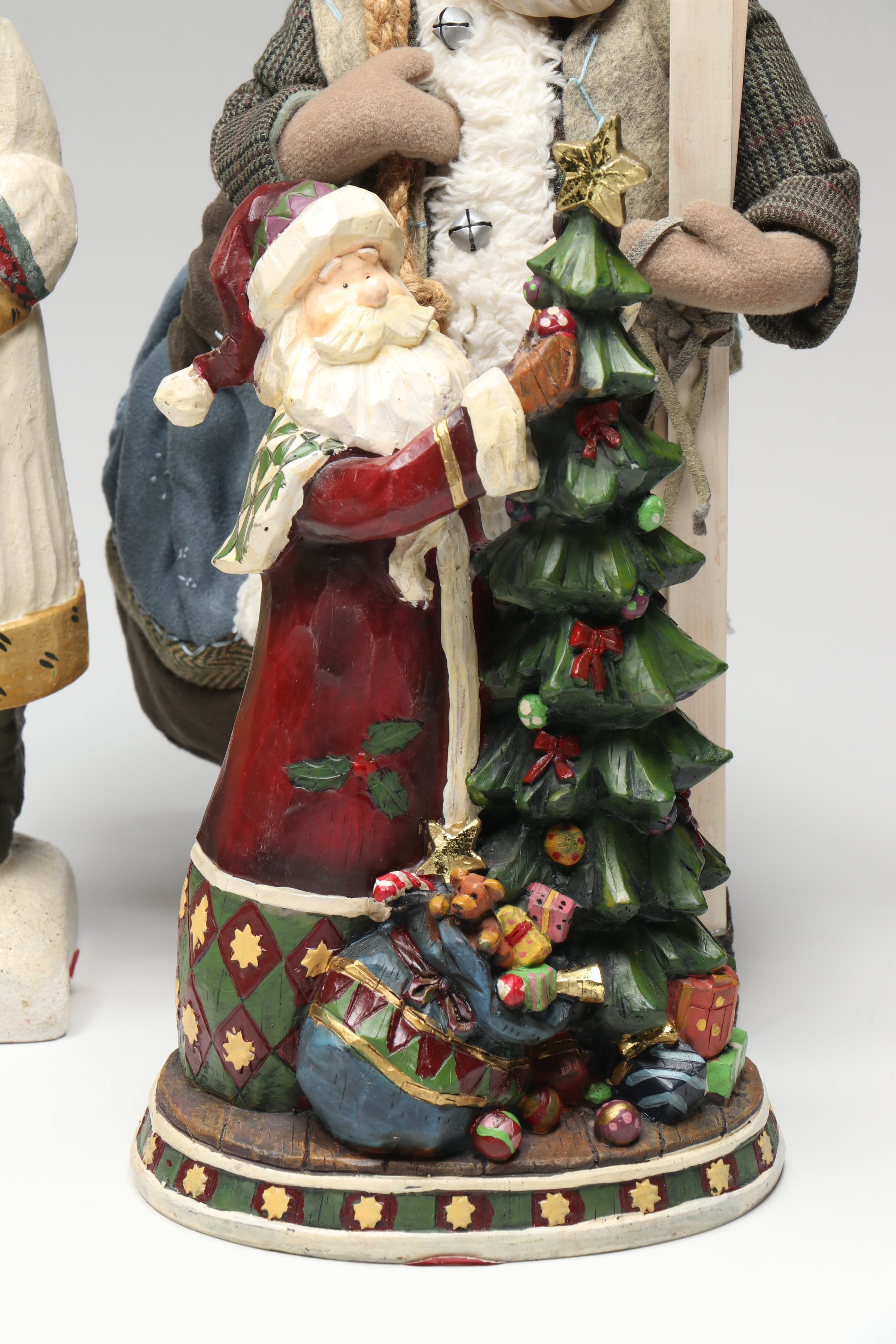 St. Nicholas Square and Other Resin Santa Claus Figurines